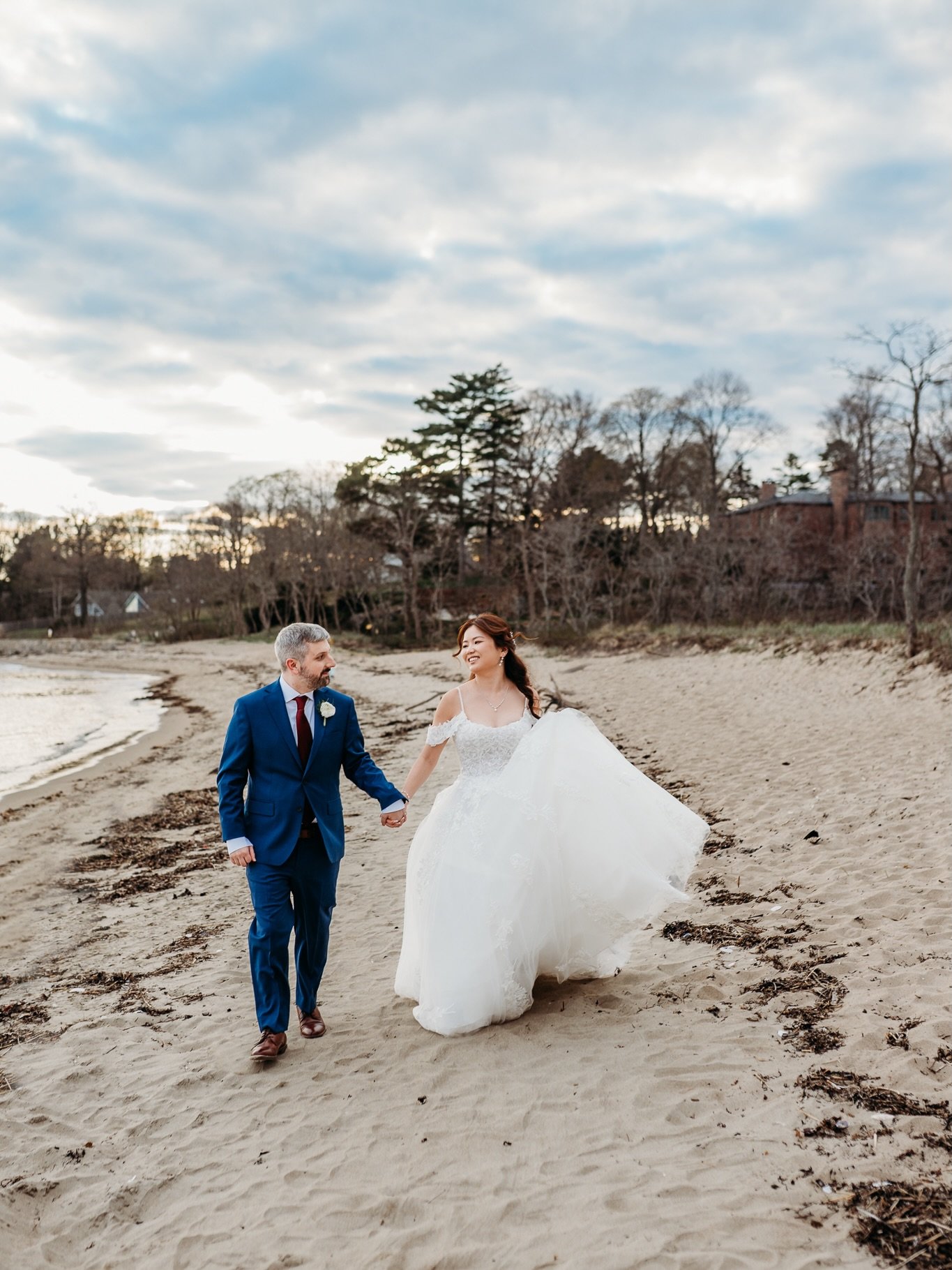 A perfect spring wedding day in Beverly Massachusetts for Elizabeth and Ryan. Tupper Manors fountain was on, the co-eds were enjoying the sunshine, and surrounded by friends and family these two had the most delightful New England spring wedding day.