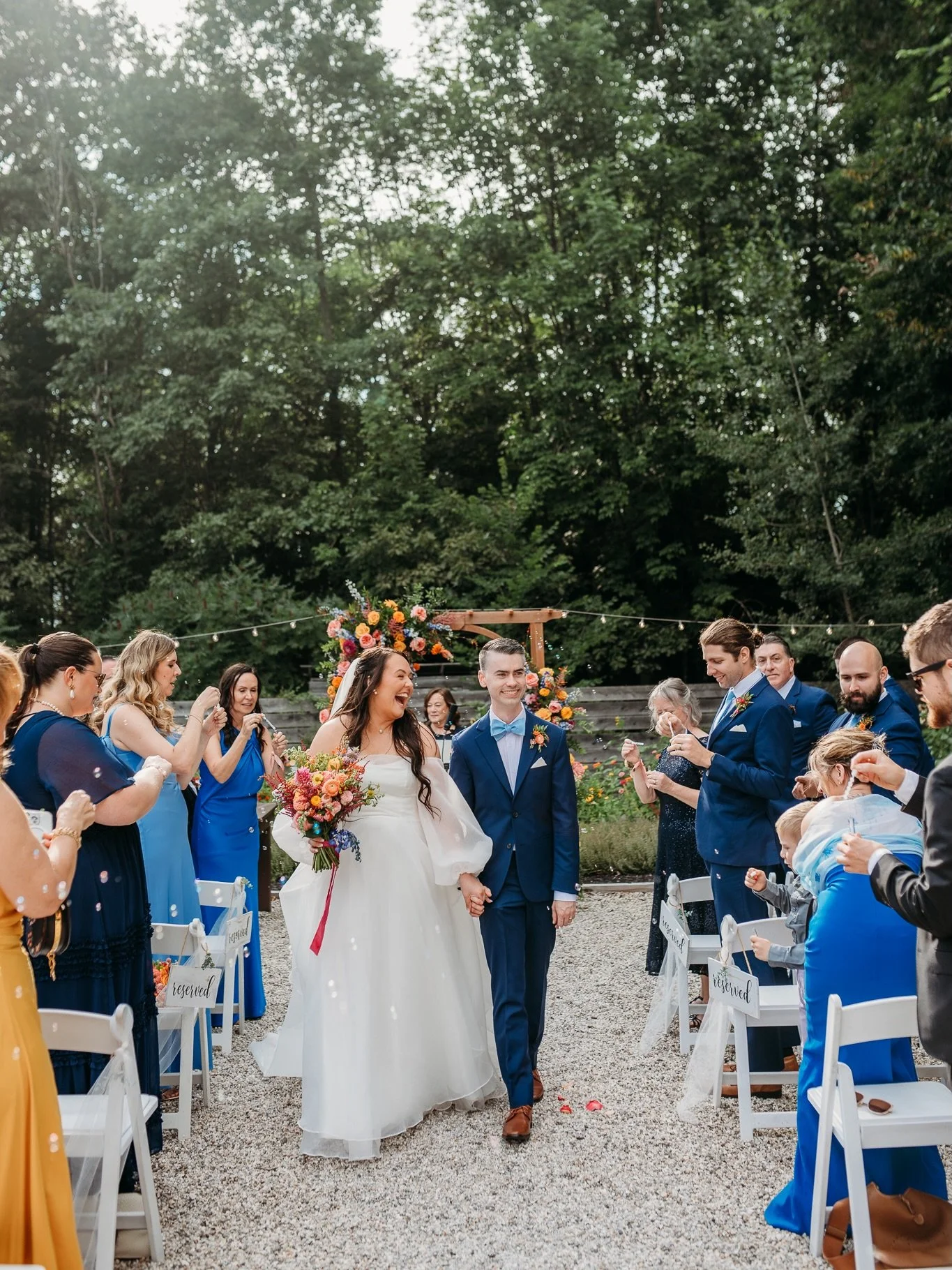 The COLORS this year have been un freaking real guys. Seriously. To walk into this wedding and see this flower arch alive with the most gorgeous summer blooms was a dream. 

The most deliciously colorful summer wedding day for Victoria and Kevin &hea