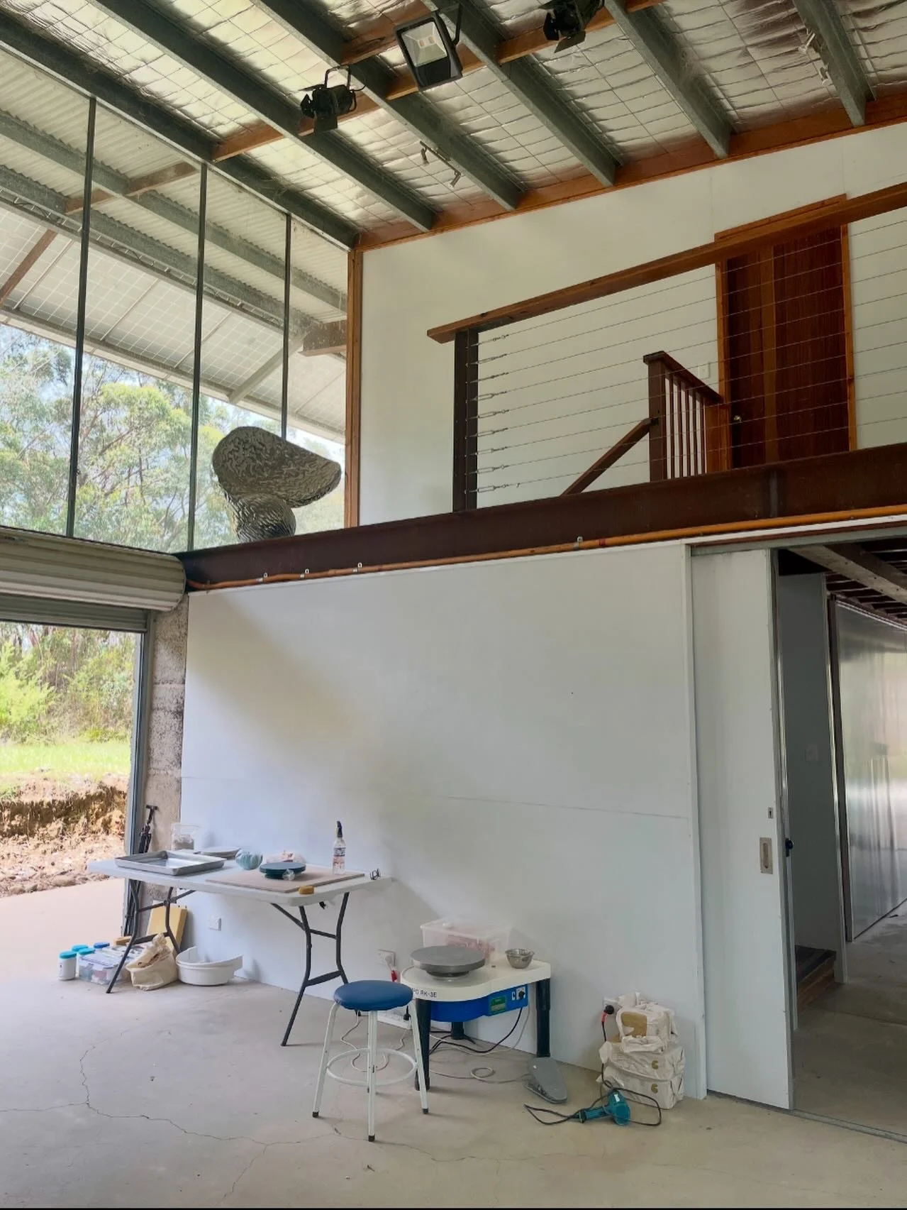 My workspace in the Art Shed at @bigciaustralia. I drove up from Melbourne with my wheel, tools, and 70kg of clay.

The door on the mezzanine above leads to my bedroom. It&rsquo;s been a few years since I had a studio at home. I&rsquo;ve been loving 