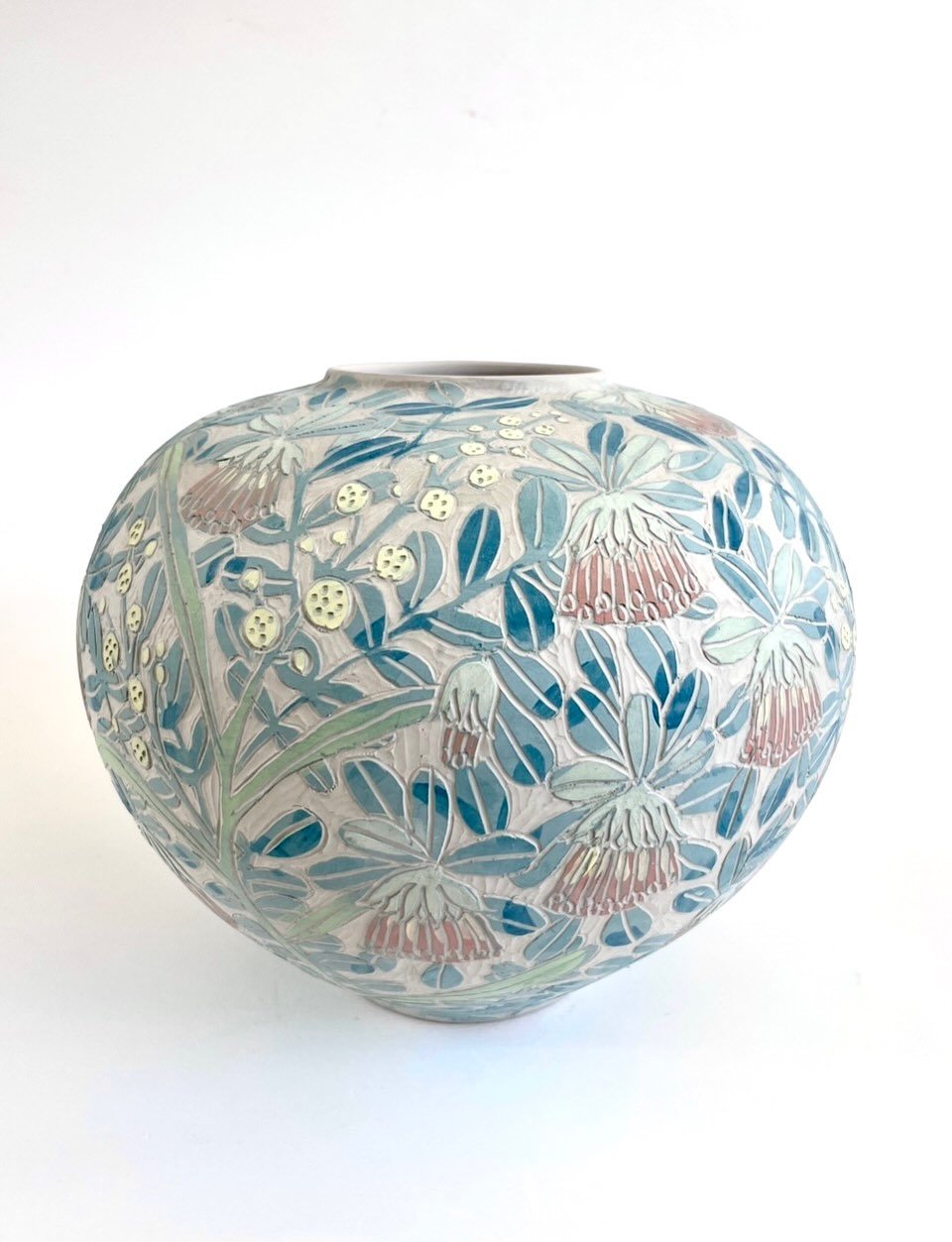 The kiln has been fired up with a big batch of work from my Western Australian wildflower series. This pot, photographed at damp greenware stage, depicts Southern Rose (Diplolaena dampieri) and acacia. The flowers on the Cape to Cape trail were so ab