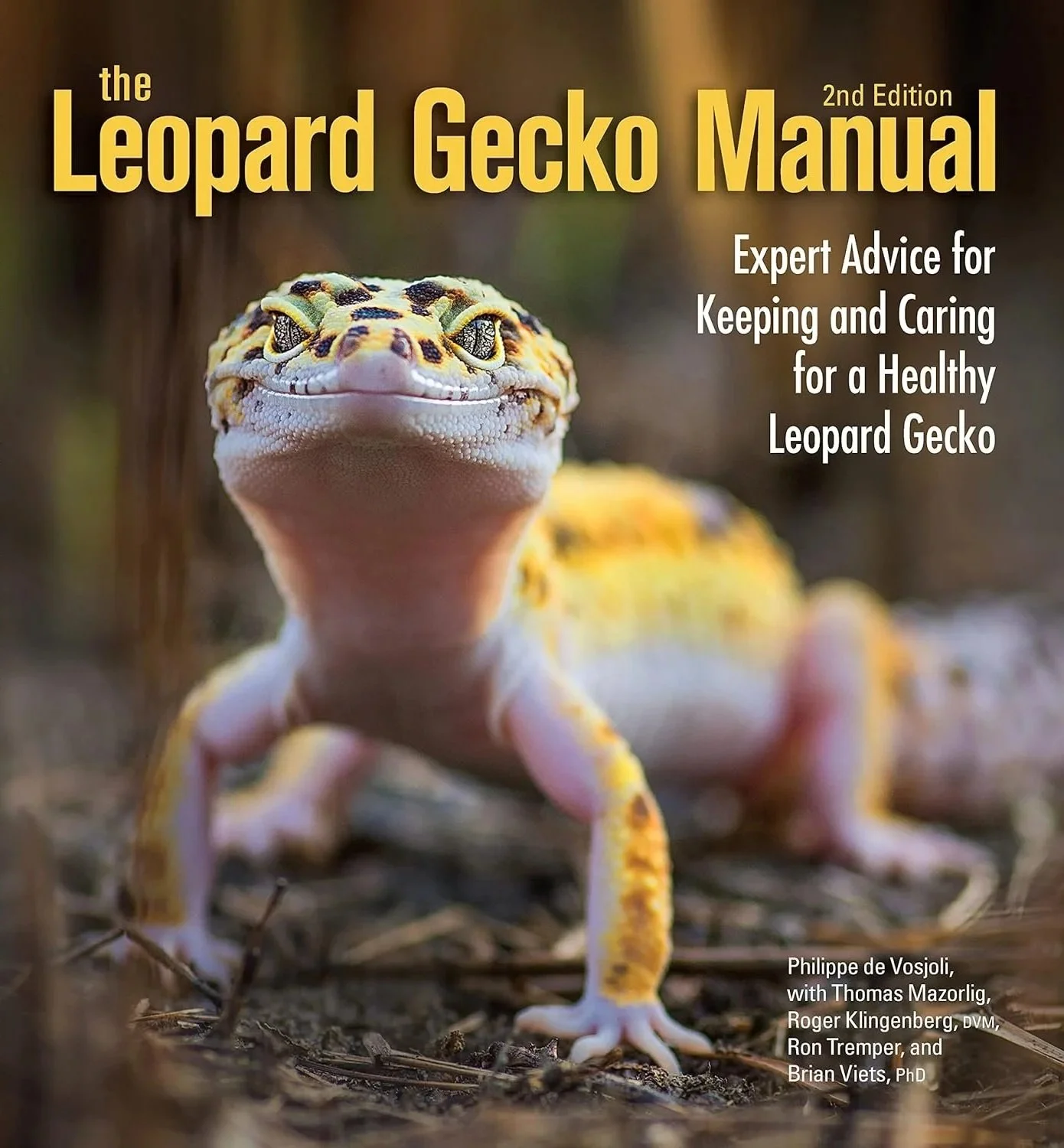 The cover of the Leopard Geckoo Manual, 2nd Edition, featuring a close-up photo of a leopard gecko with yellow and black markings, looking directly at the camera on a natural background.
