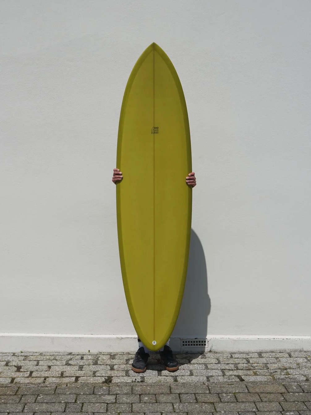 green-midlength-surfboard.png