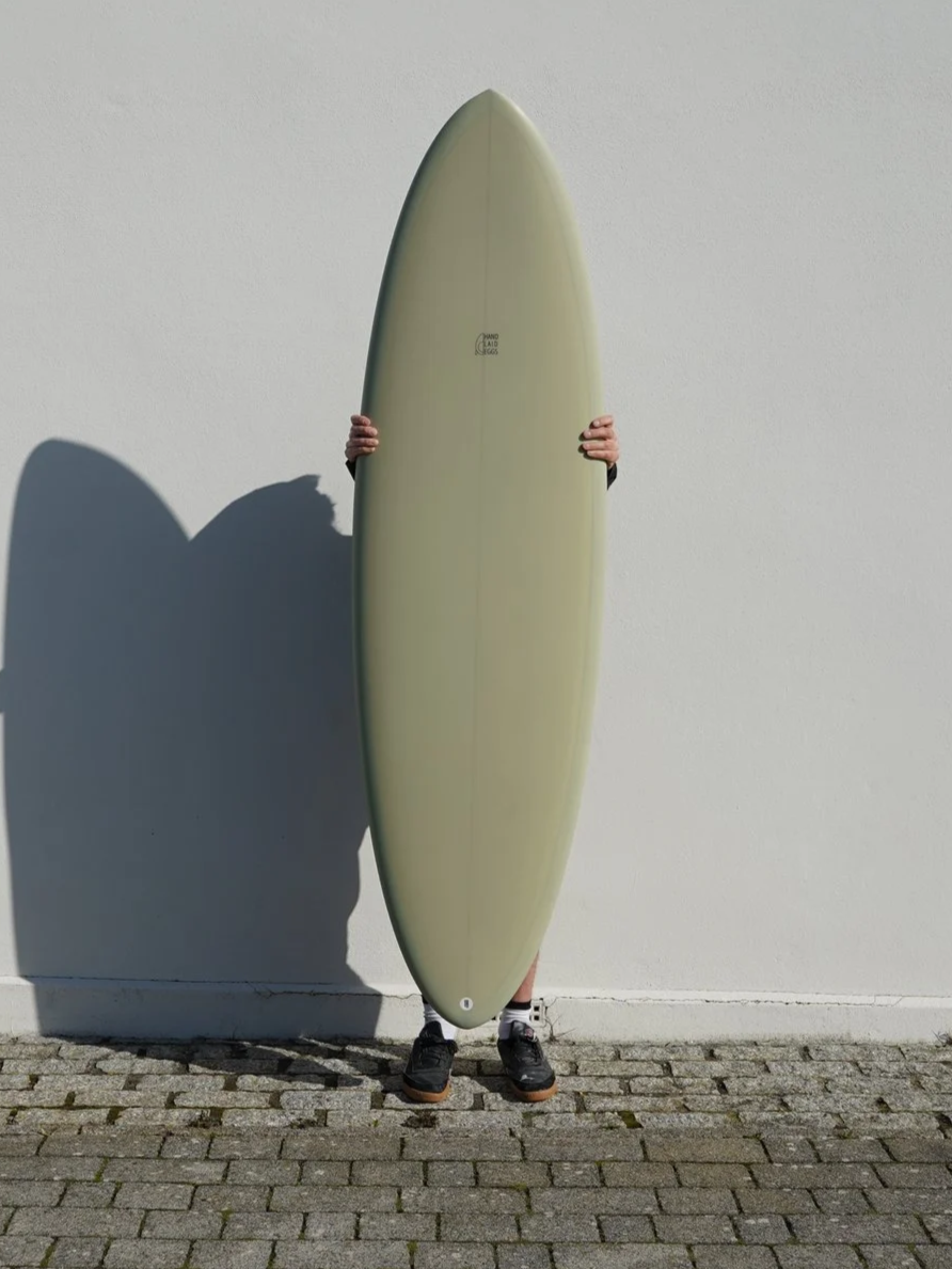 green-midlength-surfboard.png