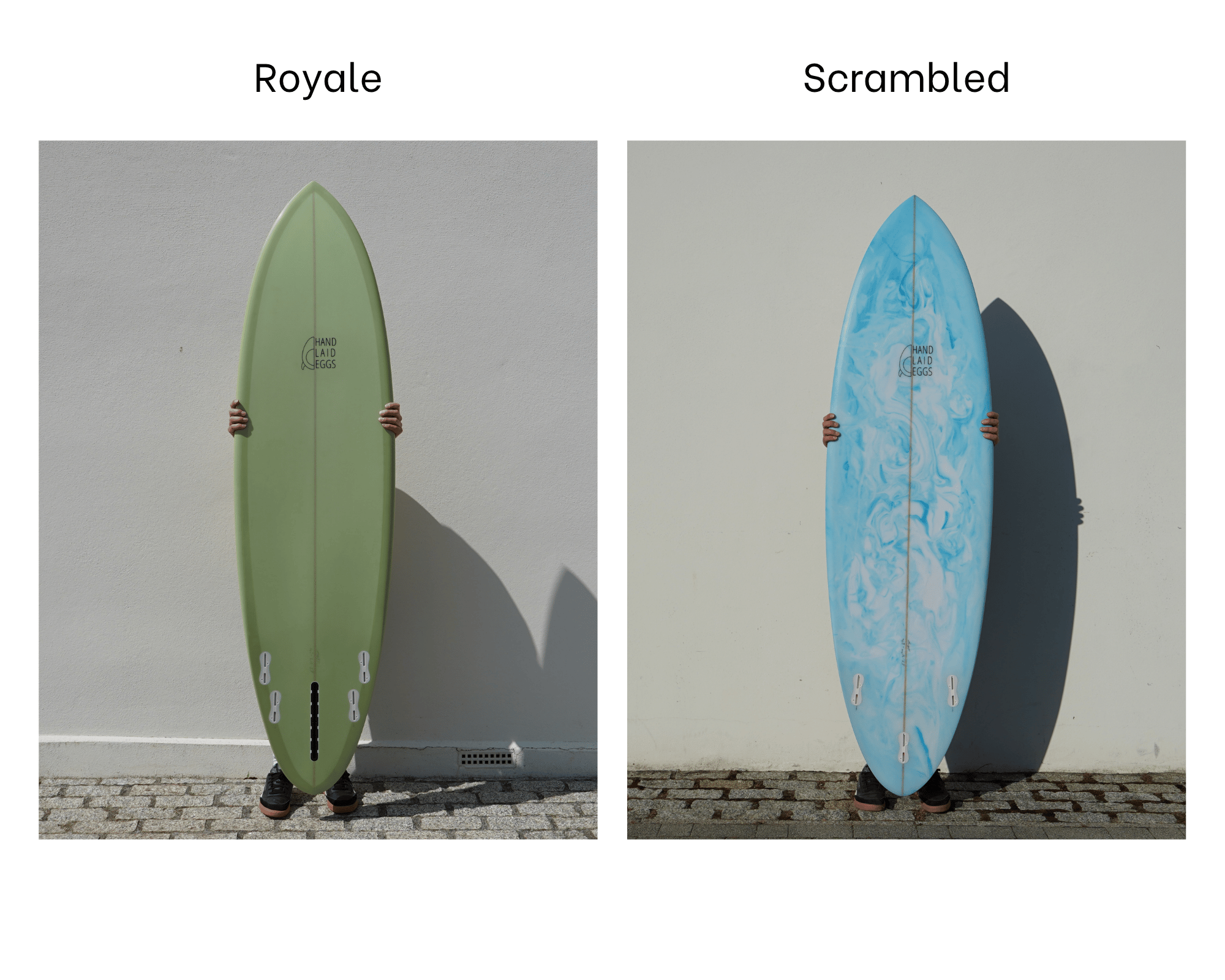 two mid length surfboards side by side