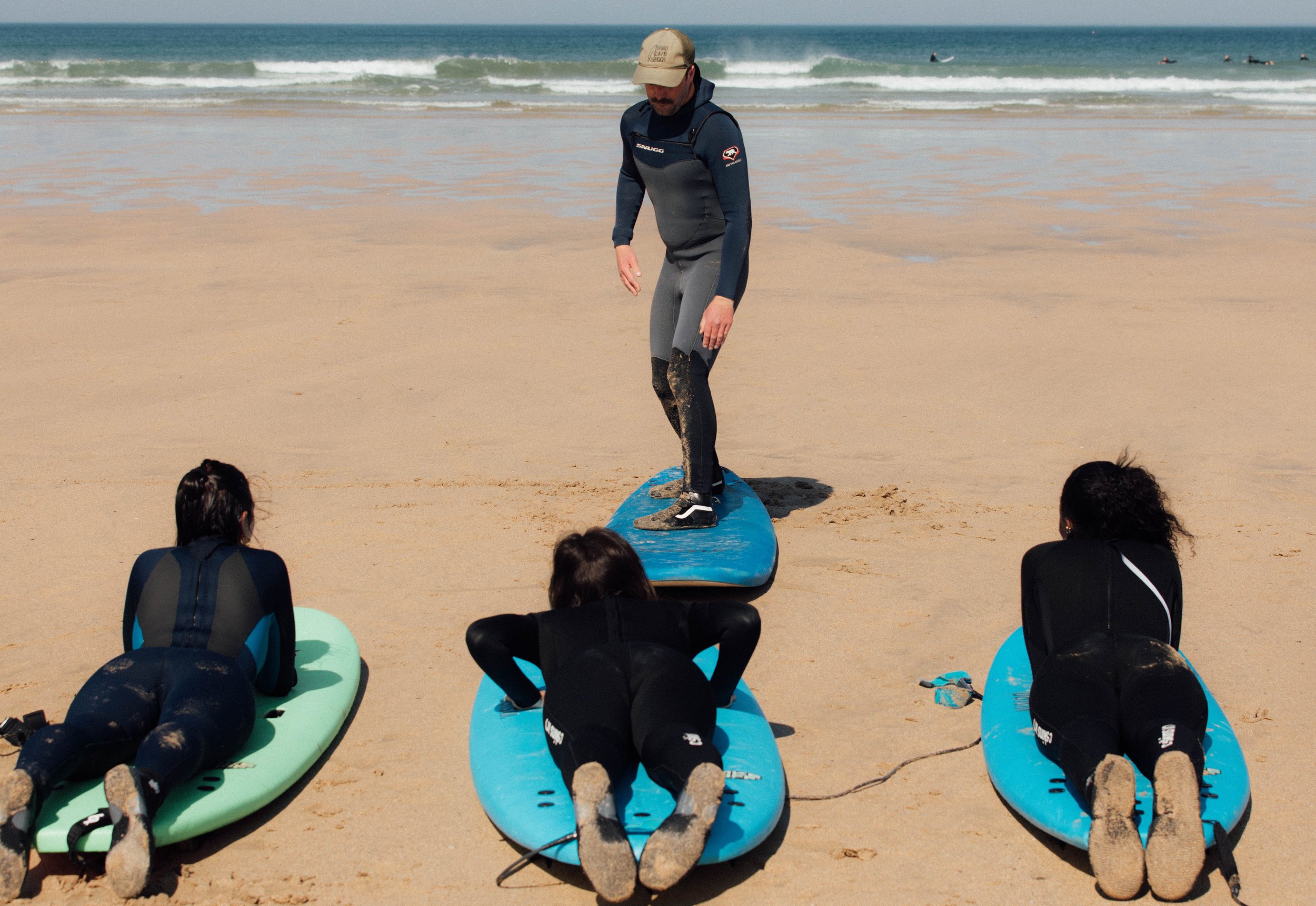 surf coach and students