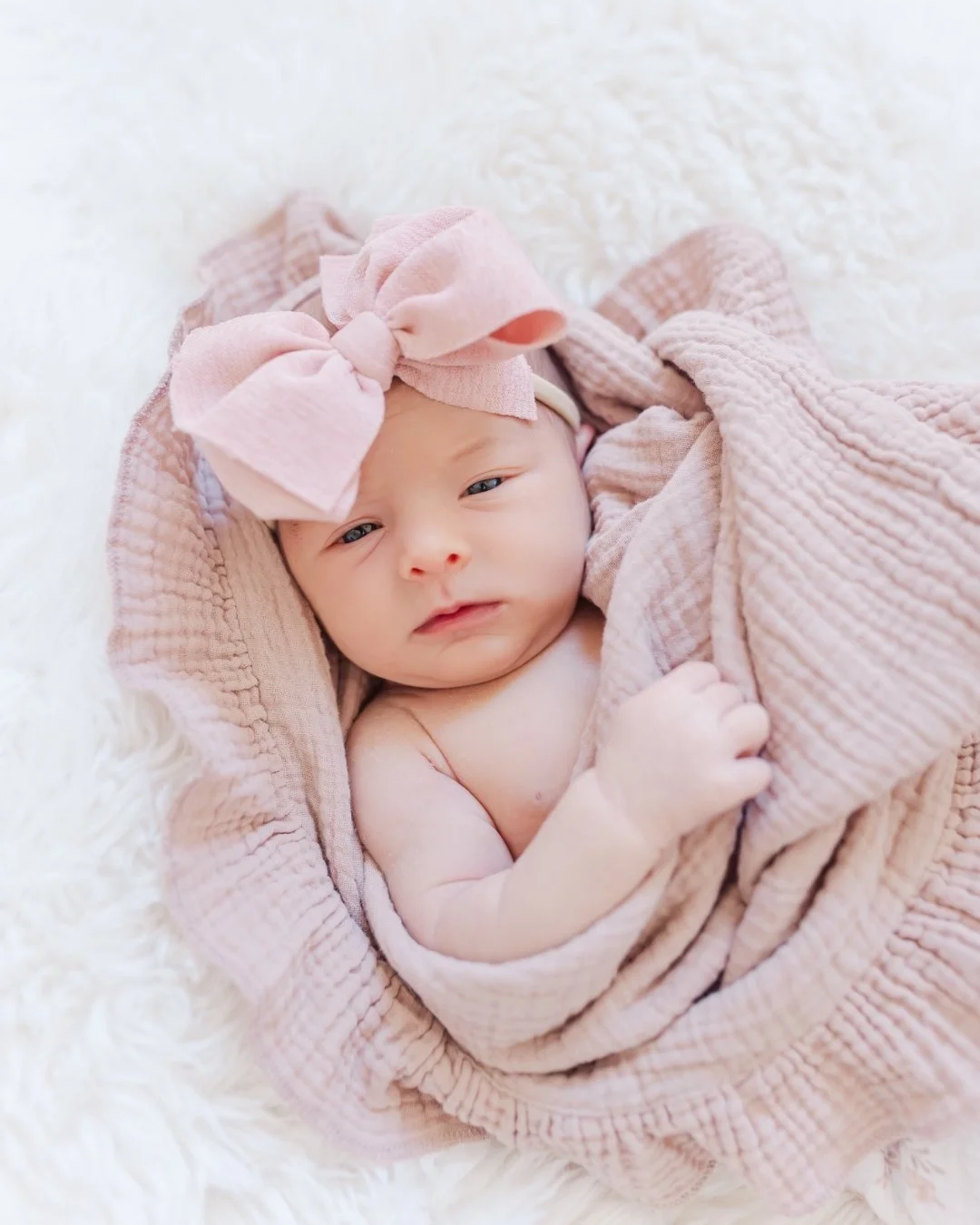 Wrapped up in love, sweetness, and just a little bit of magic 🤍

From her cozy blanket to that perfect big bow, these tiny details are what make newborn photos feel so special. This season goes by quickly &mdash; but photographs like these allow you
