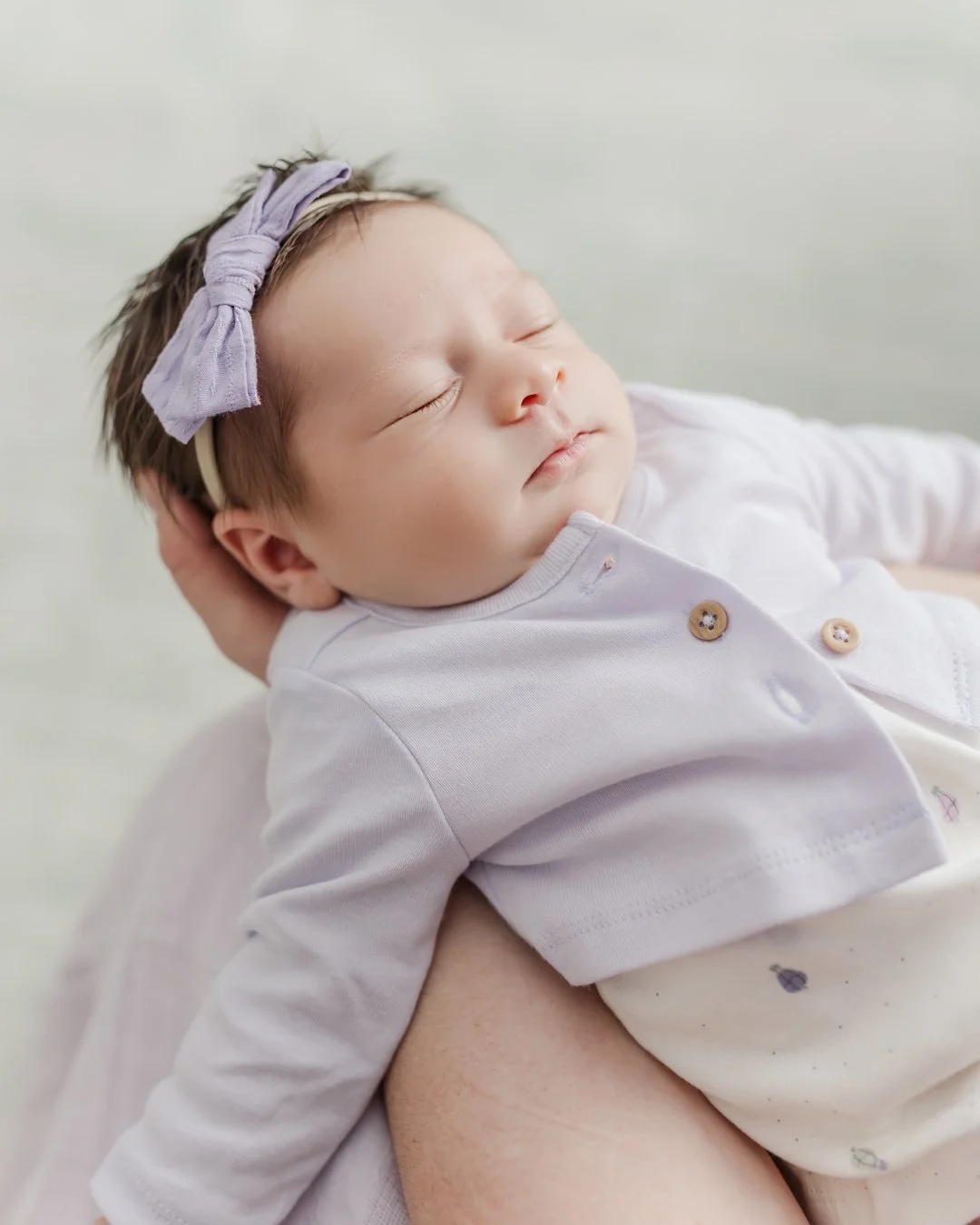 The lavender cardigan. The little bow. The way she just melts into you.

I cannot get enough of the details in these early days. They are only this tiny for such a short time.

Newborn sessions are best booked before baby arrives. 

Link in bio to ge
