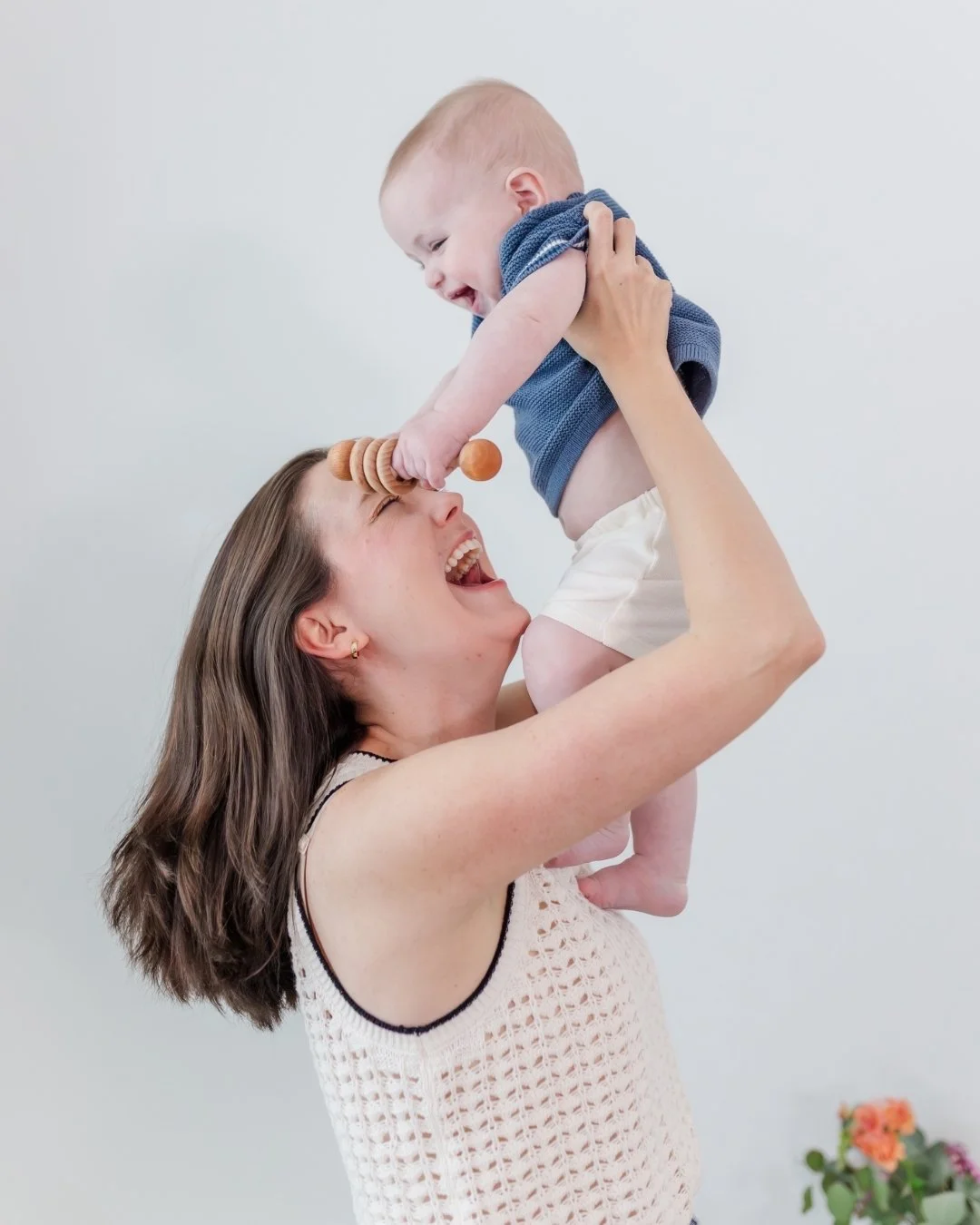 This is the one you frame.

There is something about a mom lifting her baby up mid-laugh that captures everything words can&rsquo;t. The joy, the exhaustion, the overwhelming love that makes both of those things worth it.

Studio milestone sessions a