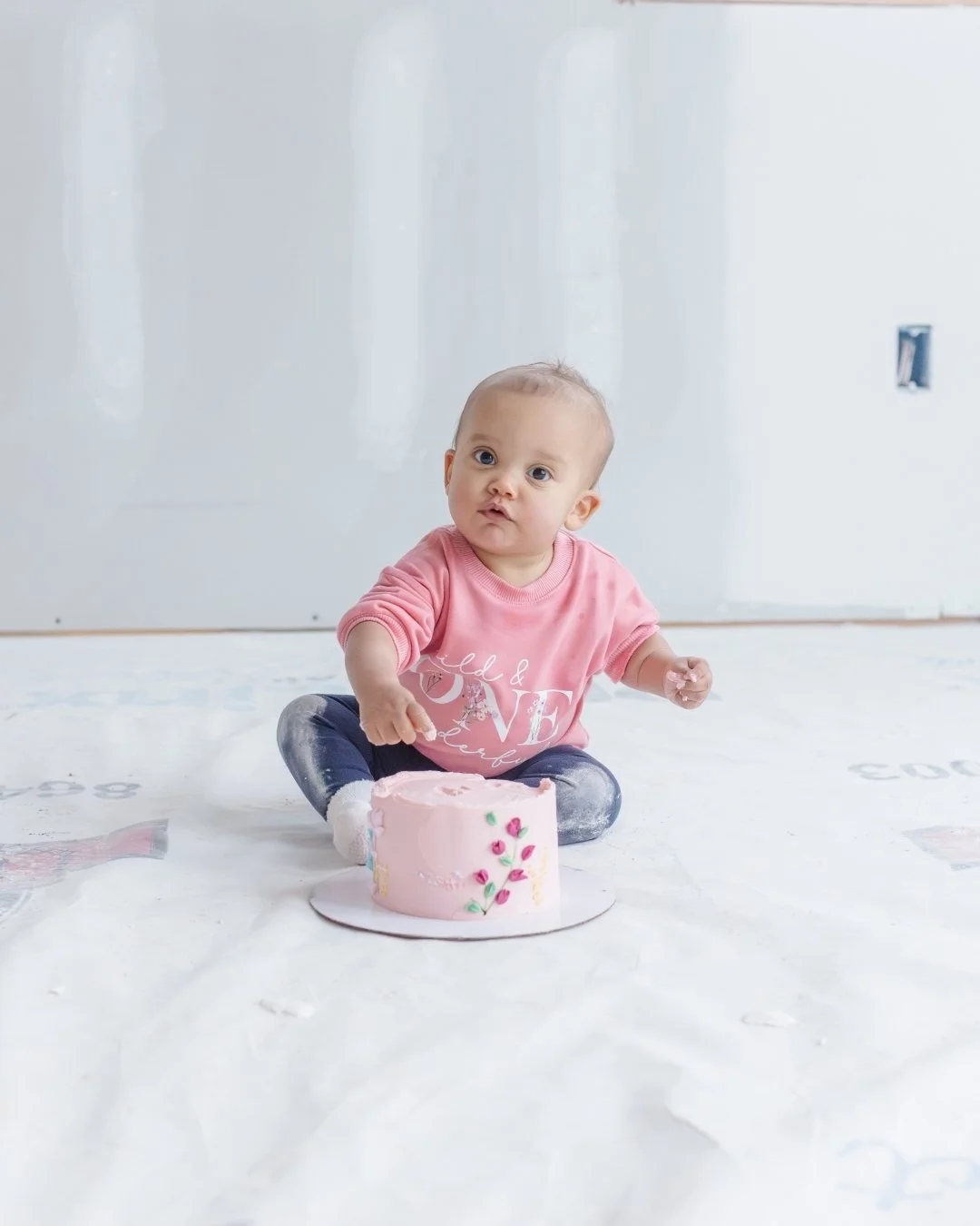 One year. One tiny cake. One very big personality.
 
First birthday sessions are one of my favorite things to photograph because babies are 100% themselves at this age. Curious, a little dramatic, and completely unbothered by the camera.
 
Milestone 