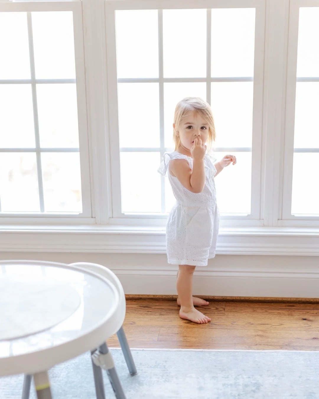 She walked right up to that window and just stood there. Like she knew.
 
Kids have this way of finding the best light in a room without anyone telling them to. My job is to be ready when it happens.
 
This is what I mean when I say lifestyle photogr