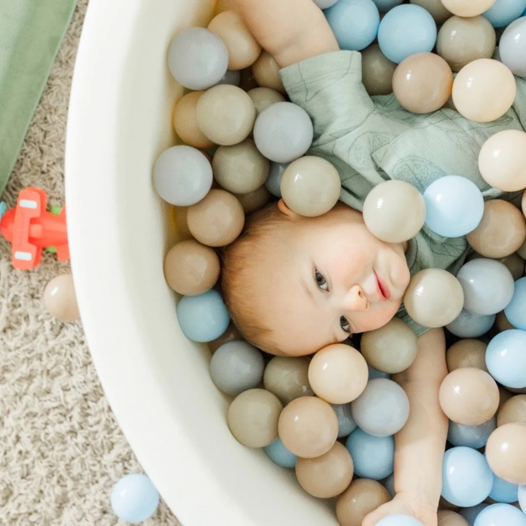 Some sessions just call for a ball pit. 🩵 This little guy couldn't get enough &mdash; and honestly, neither could we. Lifestyle family photography is all about capturing real moments like this one, right in the comfort of home.

Based in Greenville,