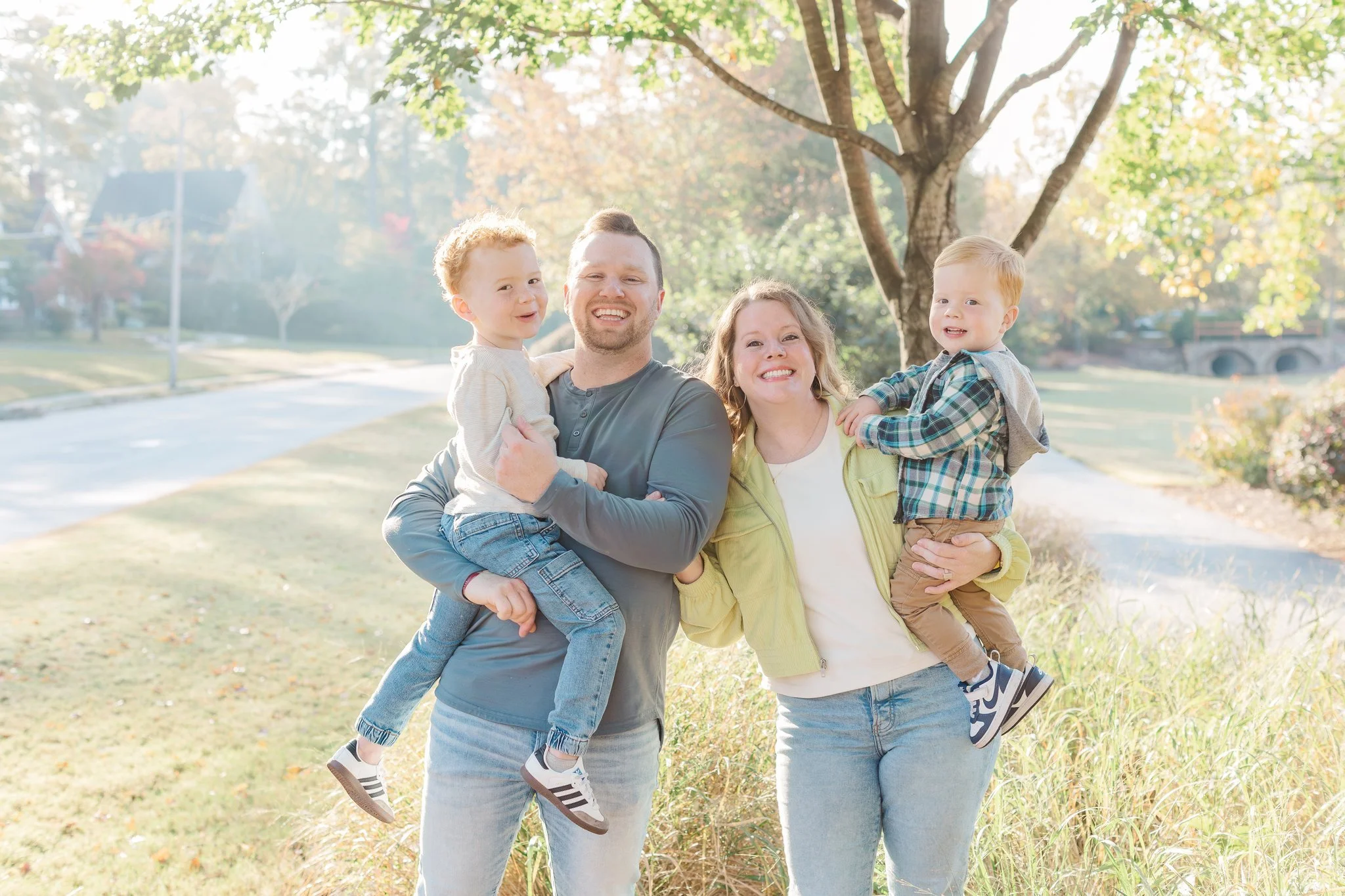 family of four at linley park in anderson south carolina for family session with erin turner photography