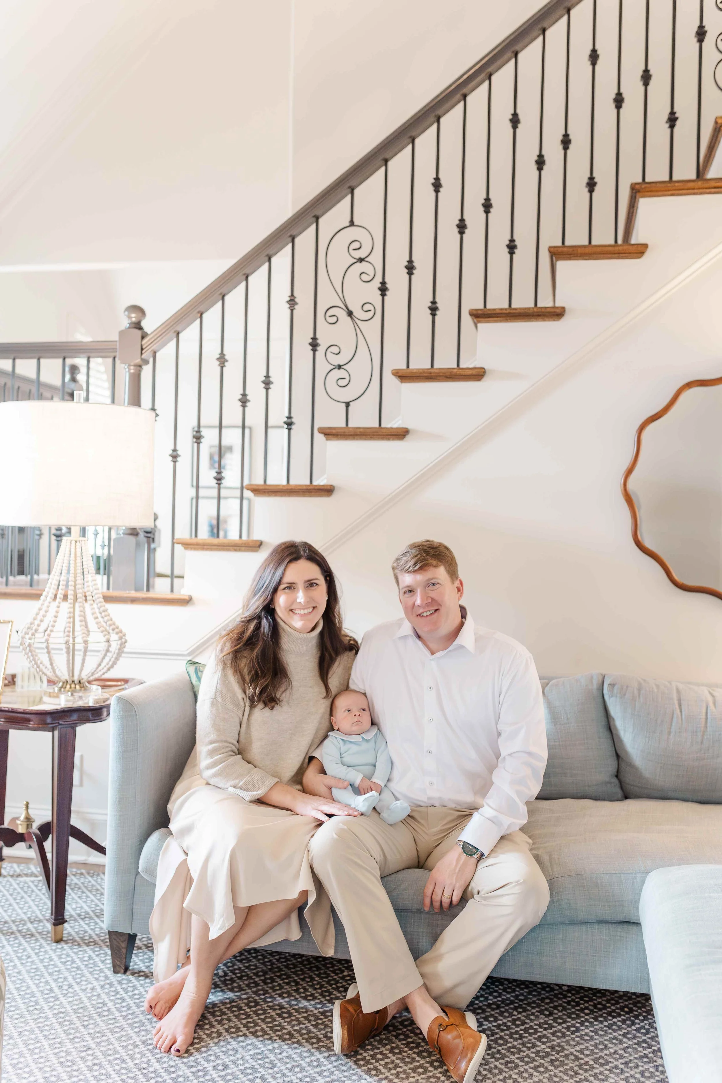 Mom and dad with newborn baby Thomas during lifestyle newborn session in Laurens, SC | Erin Turner Photography