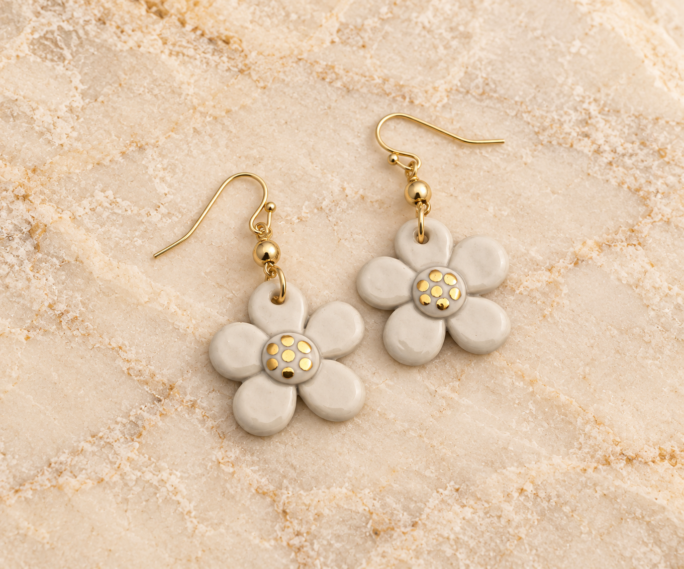 Ceramic Daisy Earrings on Warm Stone (1).png