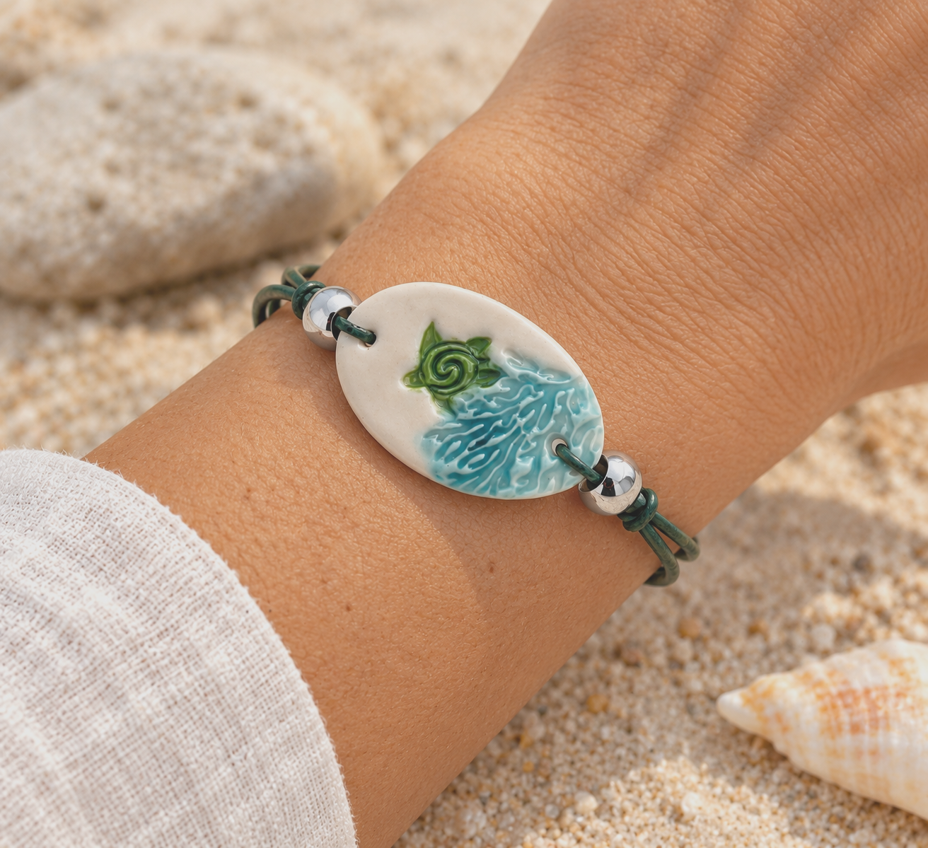 Coastal Ceramic Bracelet on Wrist (1).png