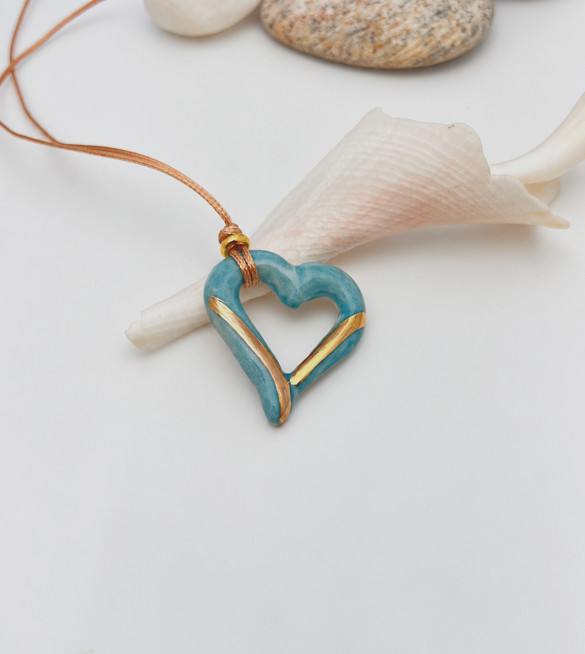 Turquoise Heart Pendant by the Sea.png