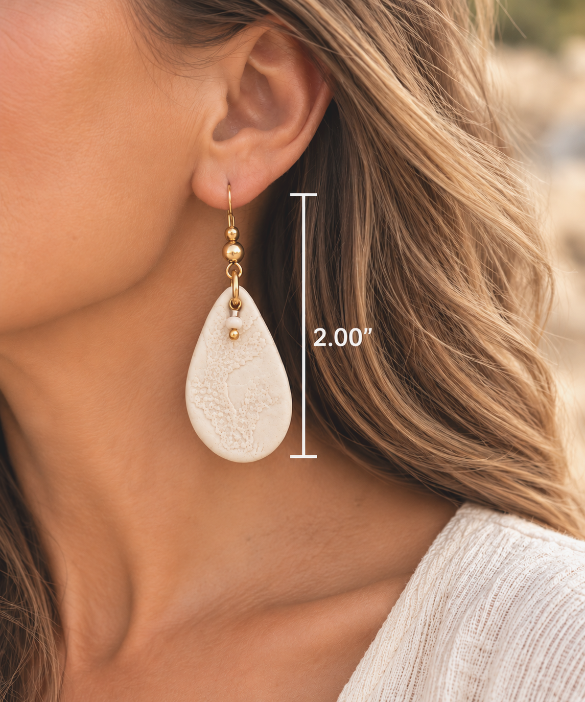 Gold Teardrop Earring Measurement Close-Up.png