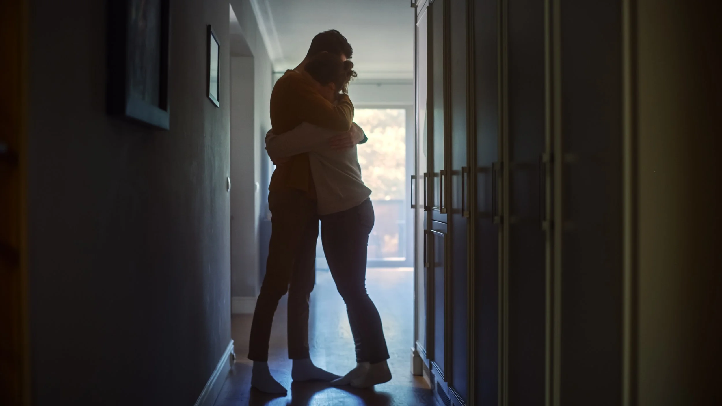 Couple embracing after repairing conflict during a couples intensive experience in Florida.