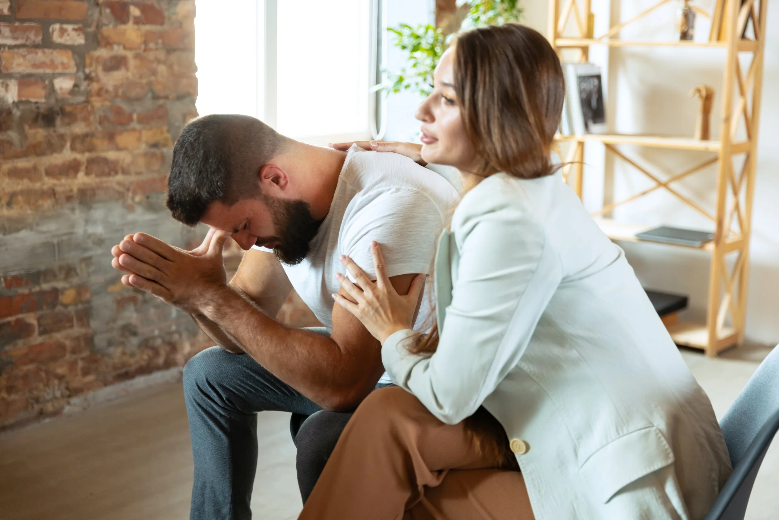 Partner offering support during an individual insight session focused on understanding relationship patterns and emotional experiences.