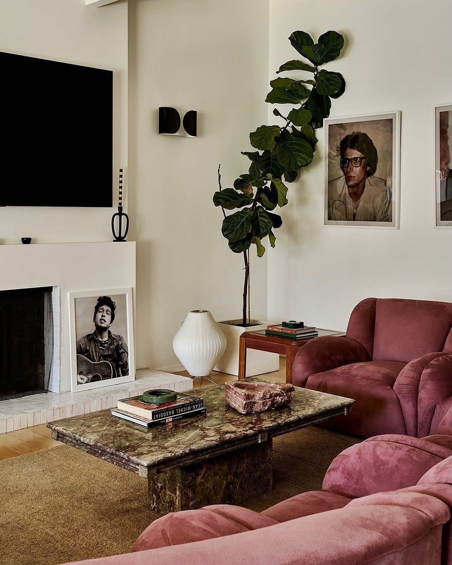 Swooning over this interior moment by @akindofhome &mdash; the sofa stopped us mid-scroll 👀 Such a cool space oozing with eclectic charm! ✨💫