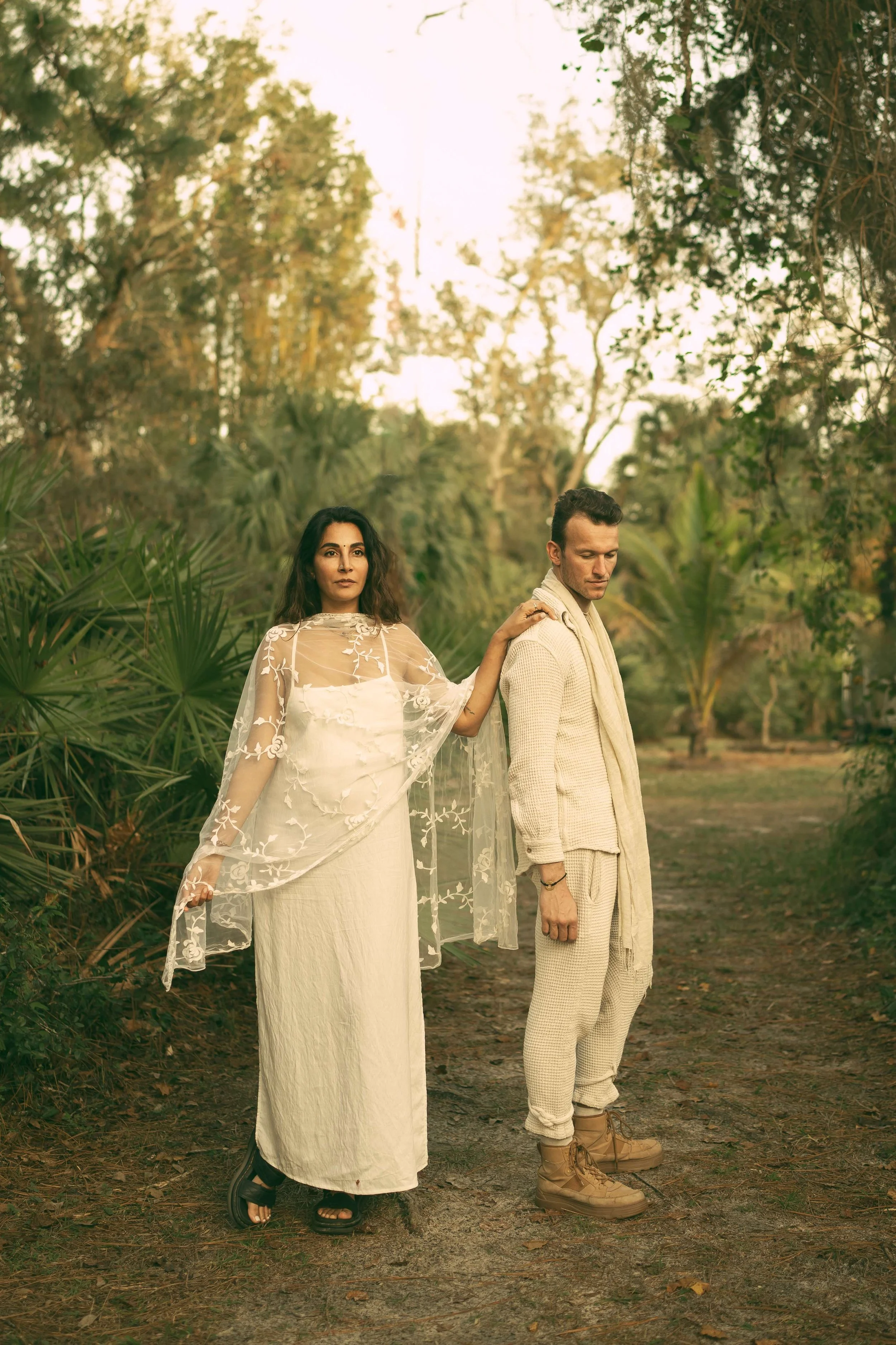 An intimate couple’s elopement at sunset. A minimalist wedding ceremony set against a quiet, expansive natural landscape.