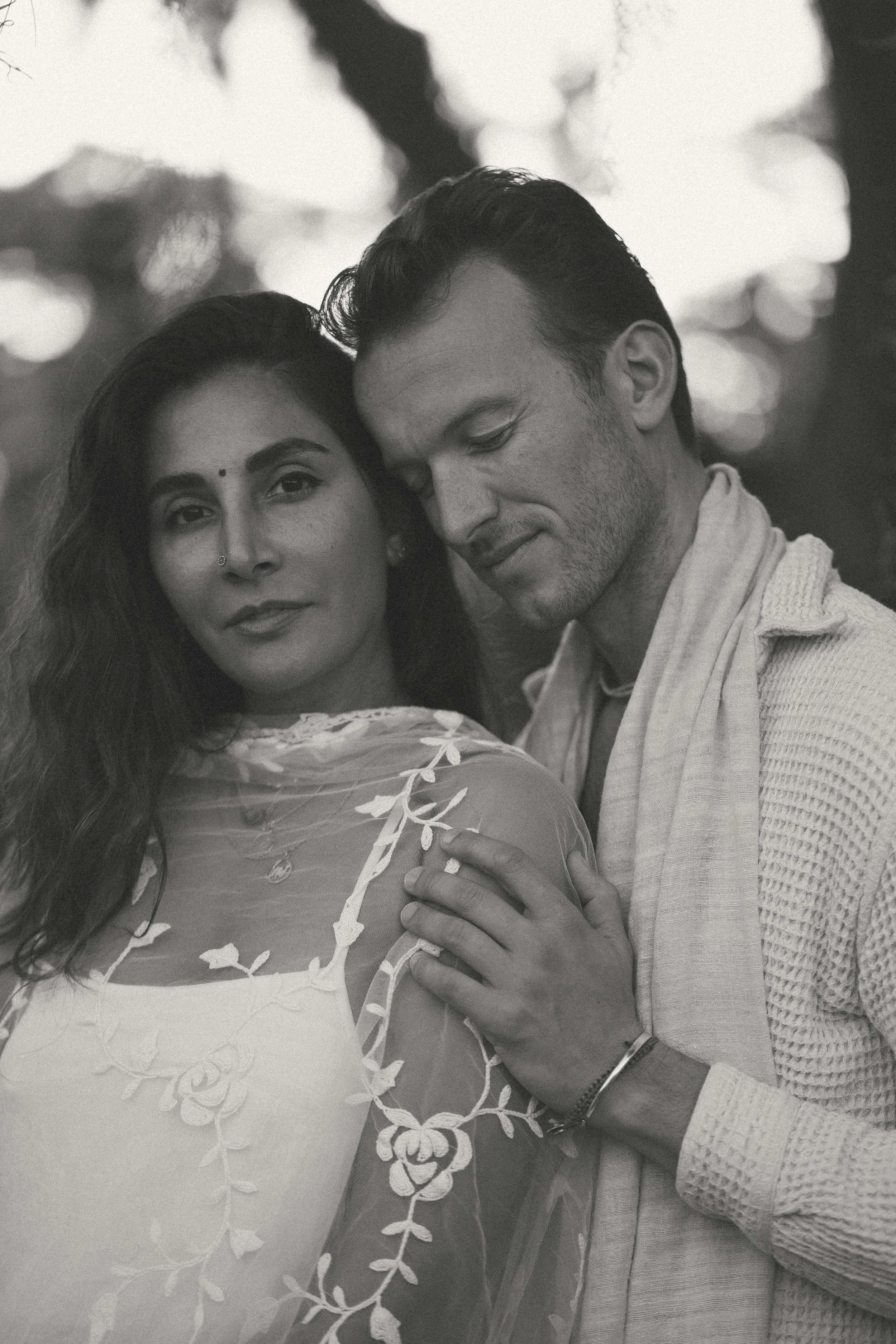 An intimate couple’s elopement at sunset. A minimalist wedding ceremony set against a quiet, expansive natural landscape.
