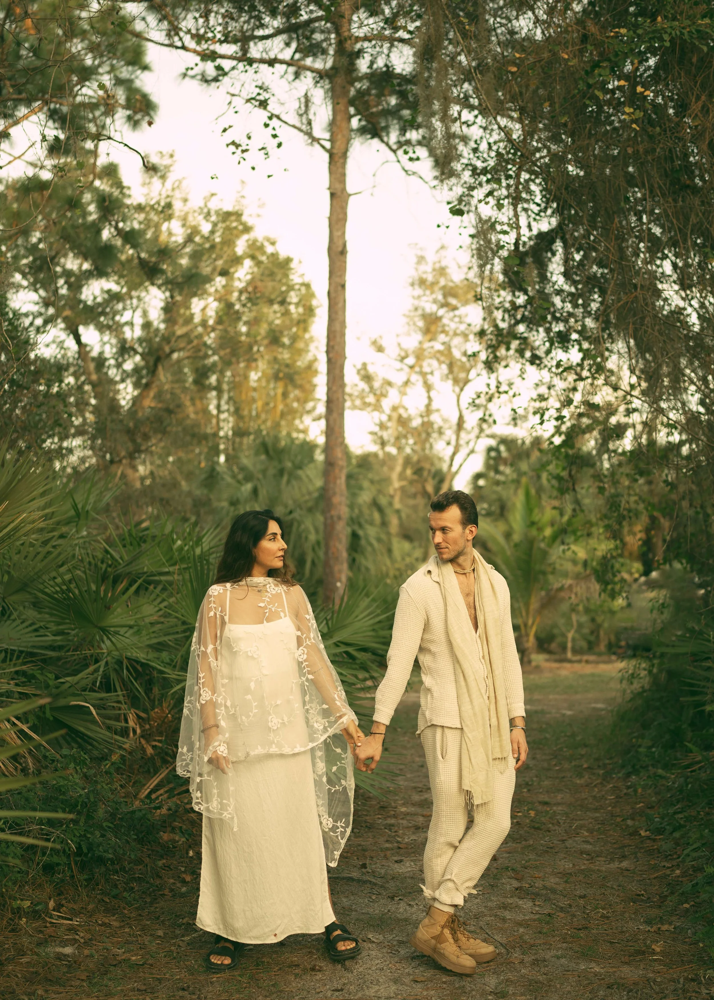 An intimate couple’s elopement at sunset. A minimalist wedding ceremony set against a quiet, expansive natural landscape.