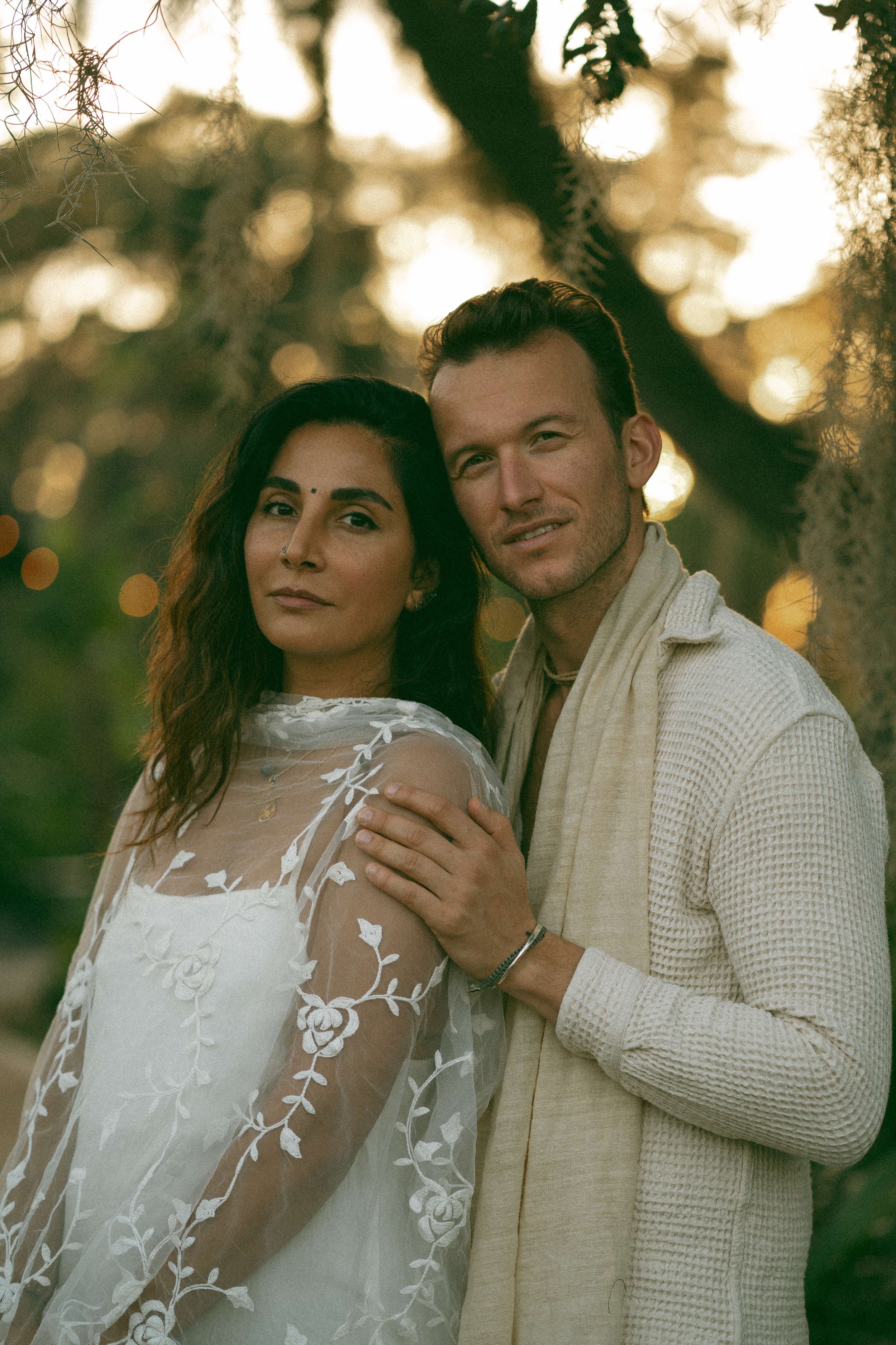 An intimate couple’s elopement at sunset. A minimalist wedding ceremony set against a quiet, expansive natural landscape.