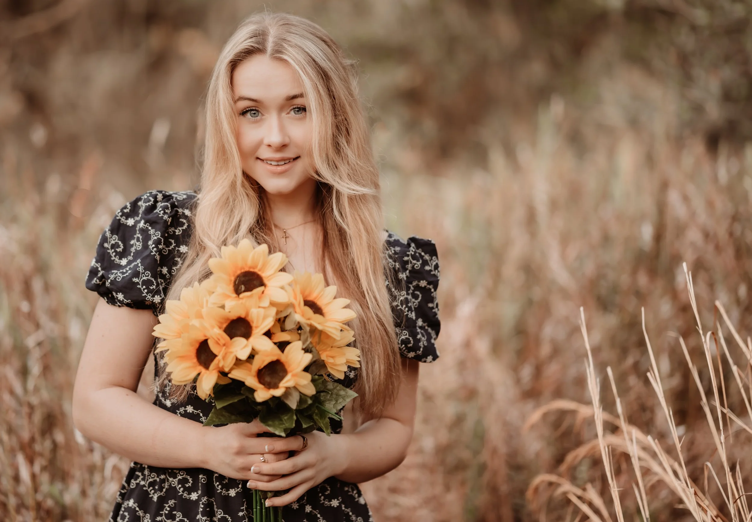 Senior and graduation photography session Orlando  sunflowers field