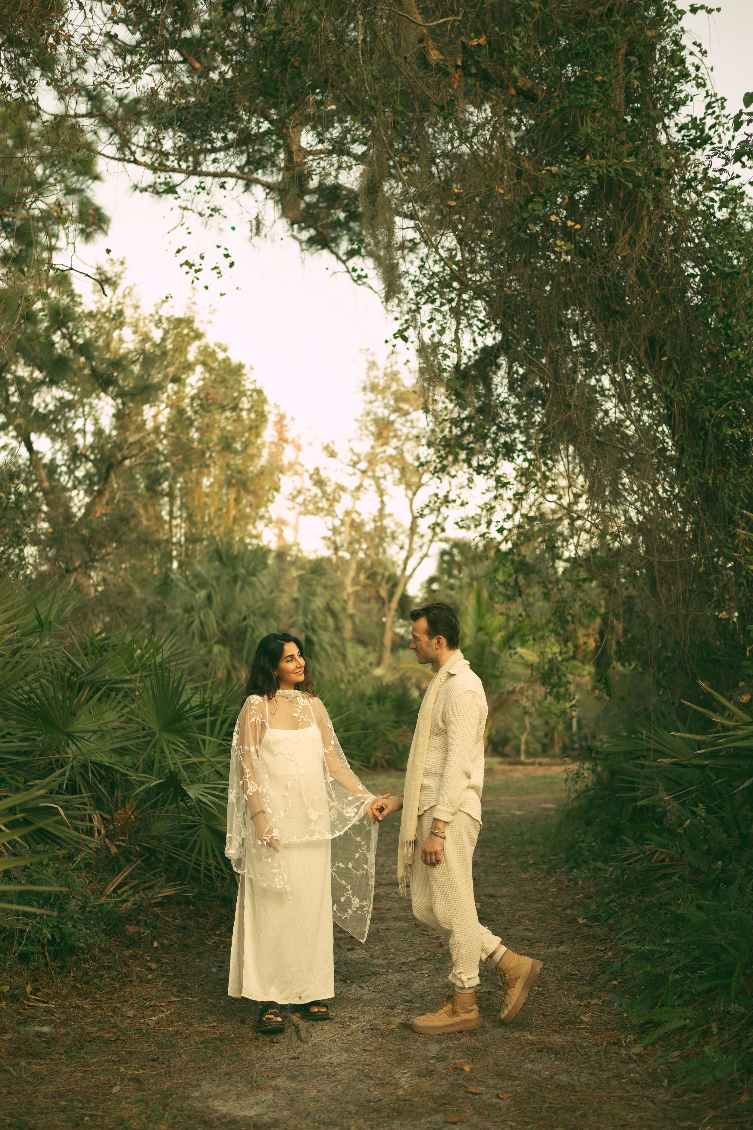 An intimate couple’s elopement at sunset. A minimalist wedding ceremony set against a quiet, expansive natural landscape.