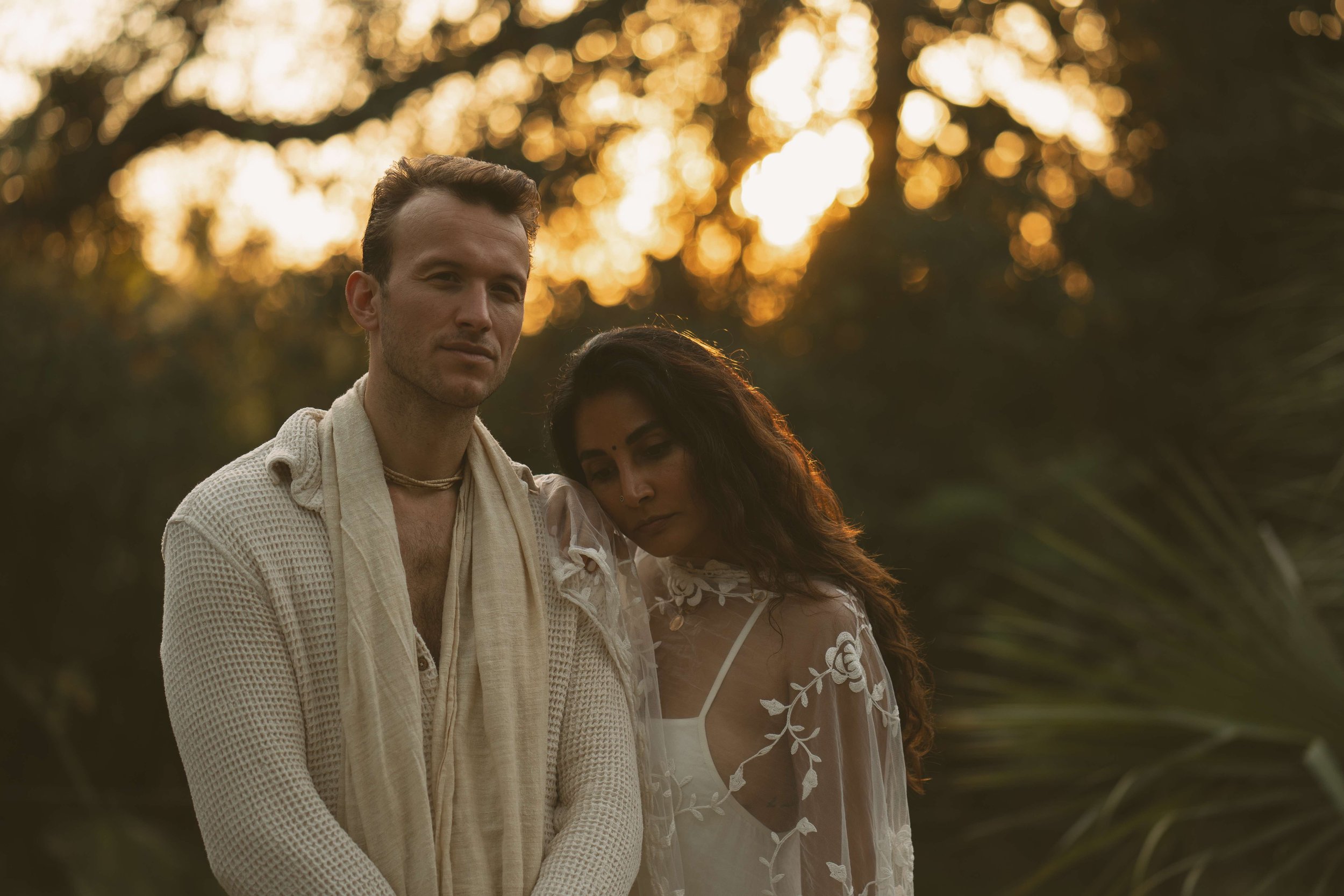 An intimate couple’s elopement at sunset. A minimalist wedding ceremony set against a quiet, expansive natural landscape.
