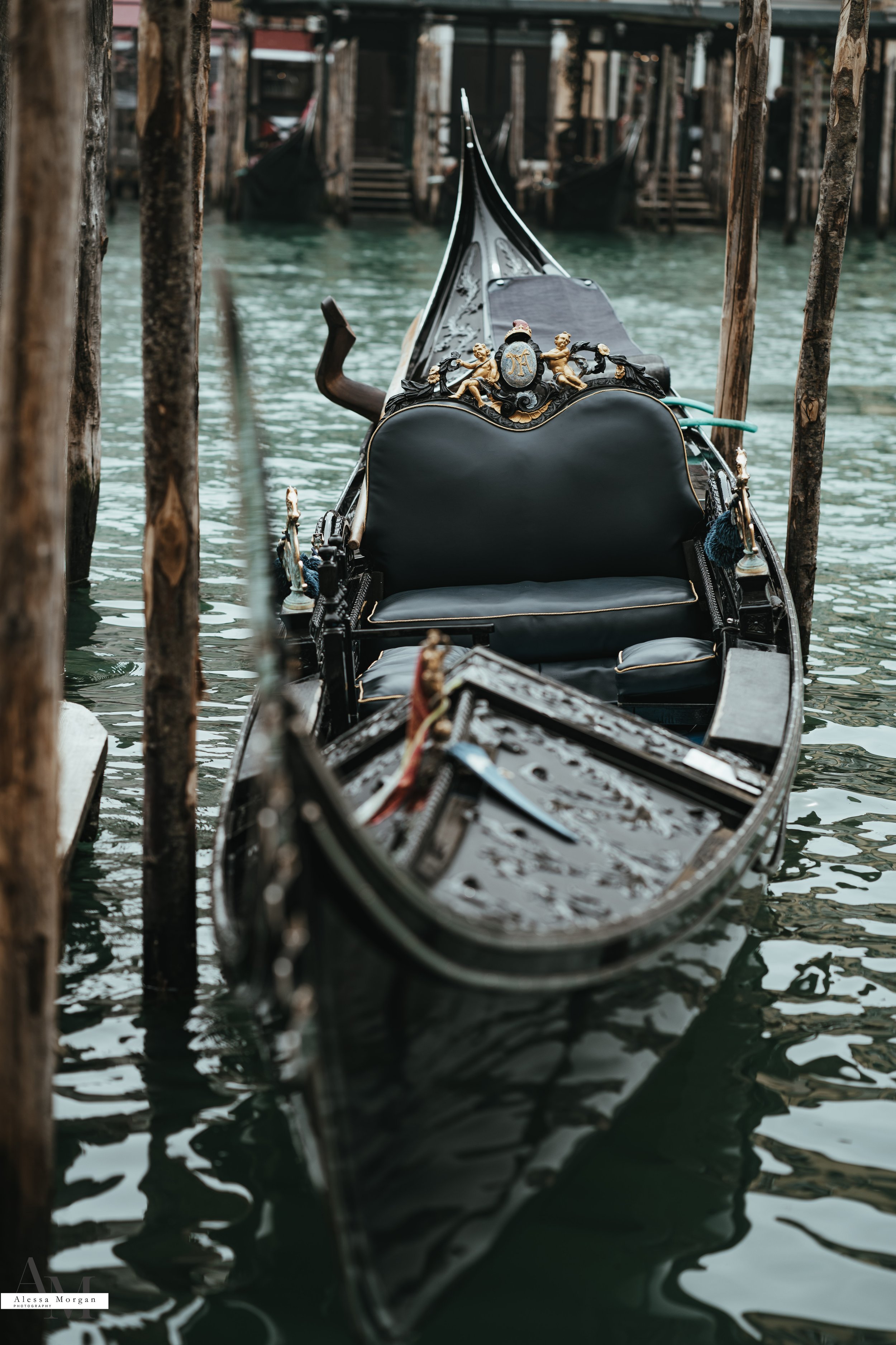 street photography, market, fish market Venice, Venice, Italy, Orlando, Florida, photographer, portrait, black and white photography, capturing moments, seagull with fish, fish, market, gondola, black gondola