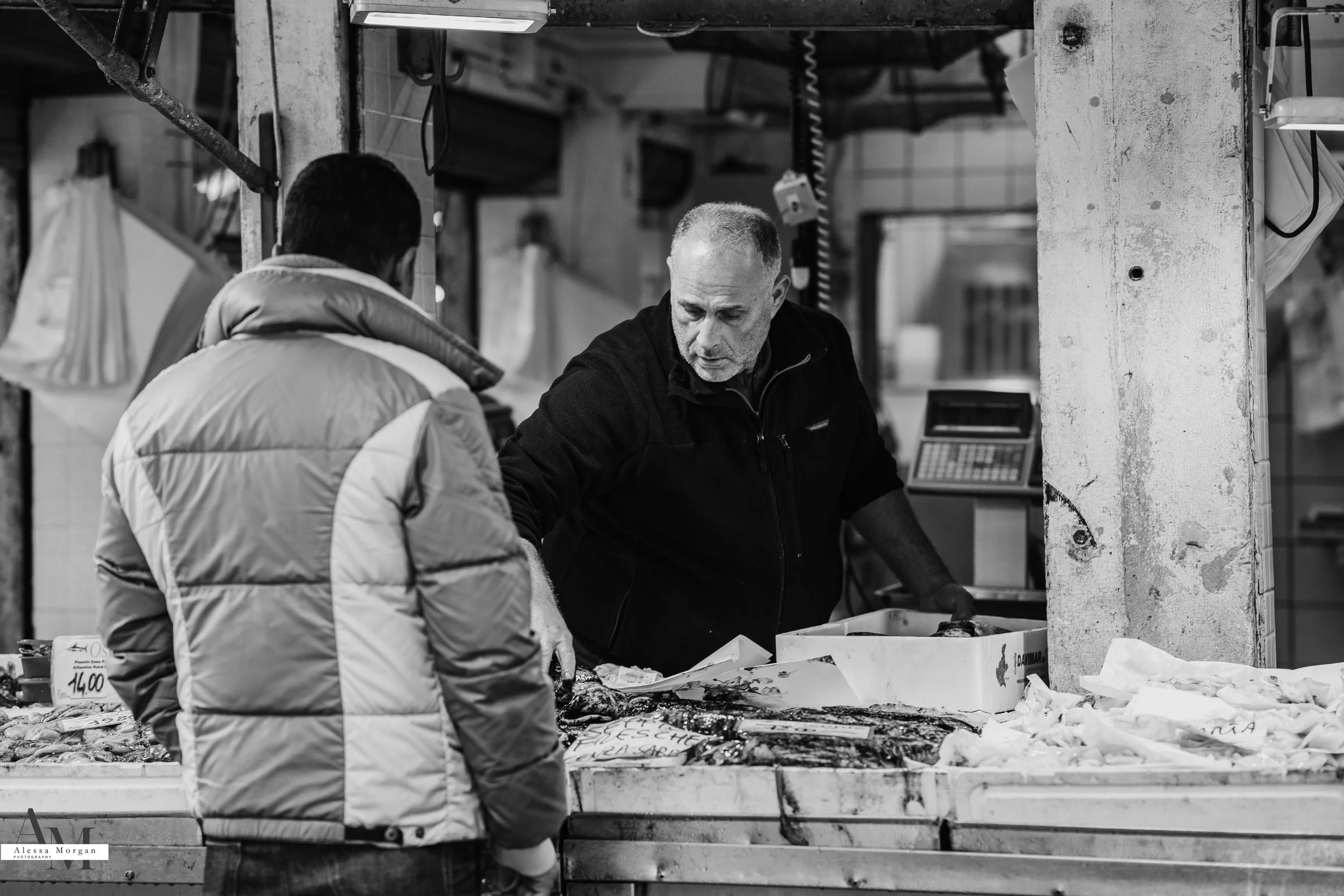 street photography, market, fish market Venice, Venice, Italy, Orlando, Florida, photographer, portrait, black and white photography, capturing moments, seagull with fish, fish, market