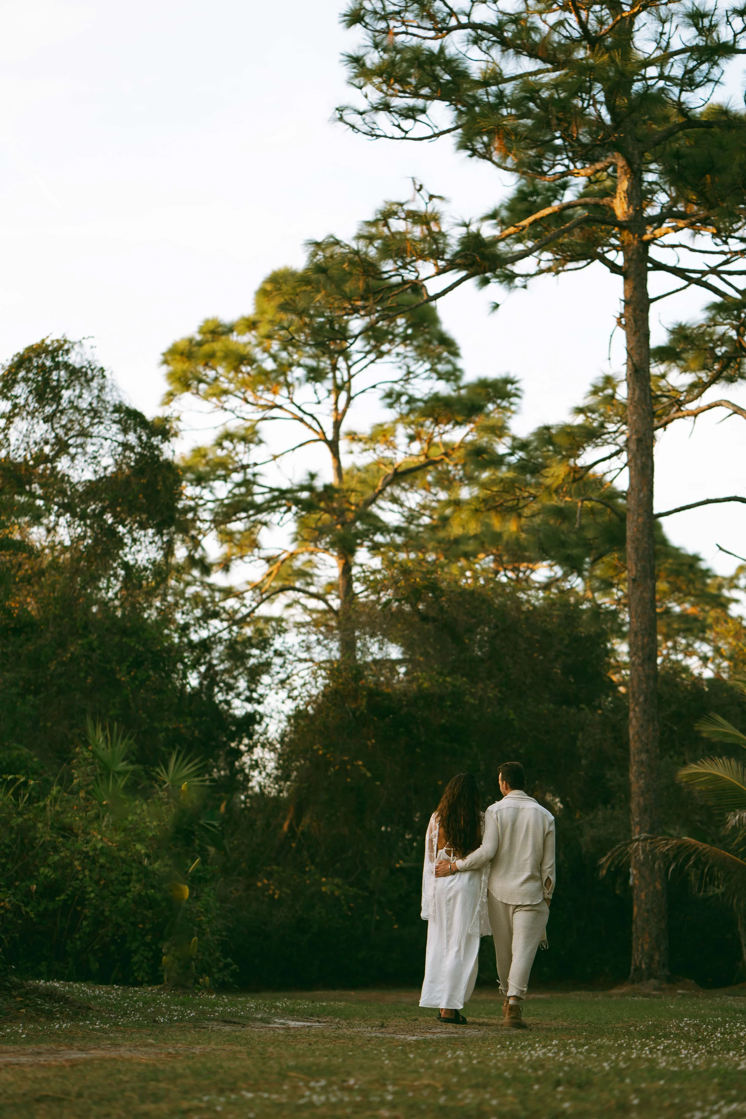 An intimate couple’s elopement at sunset. A minimalist wedding ceremony set against a quiet, expansive natural landscape.