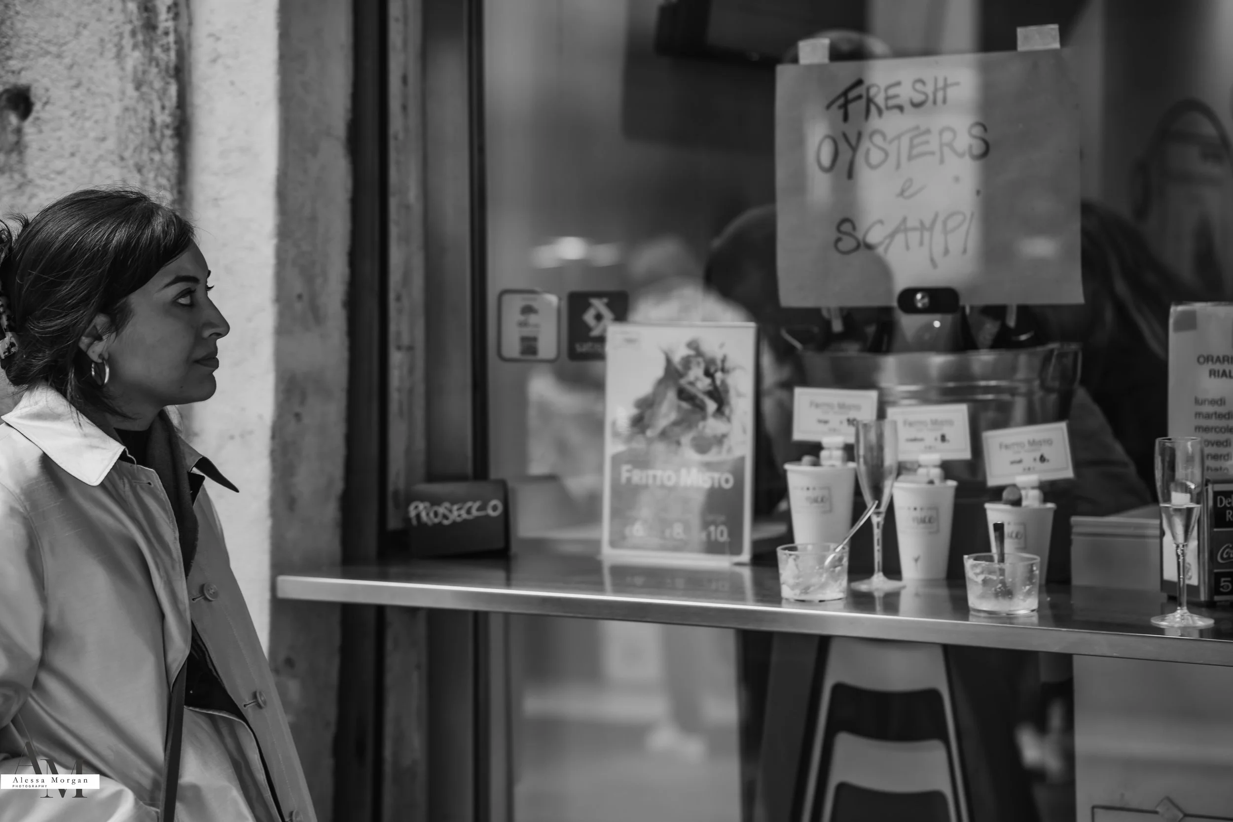 street photography, market, fish market Venice, Venice, Italy, Orlando, Florida, photographer, portrait, black and white photography, capturing moments, seagull with fish, fish, market