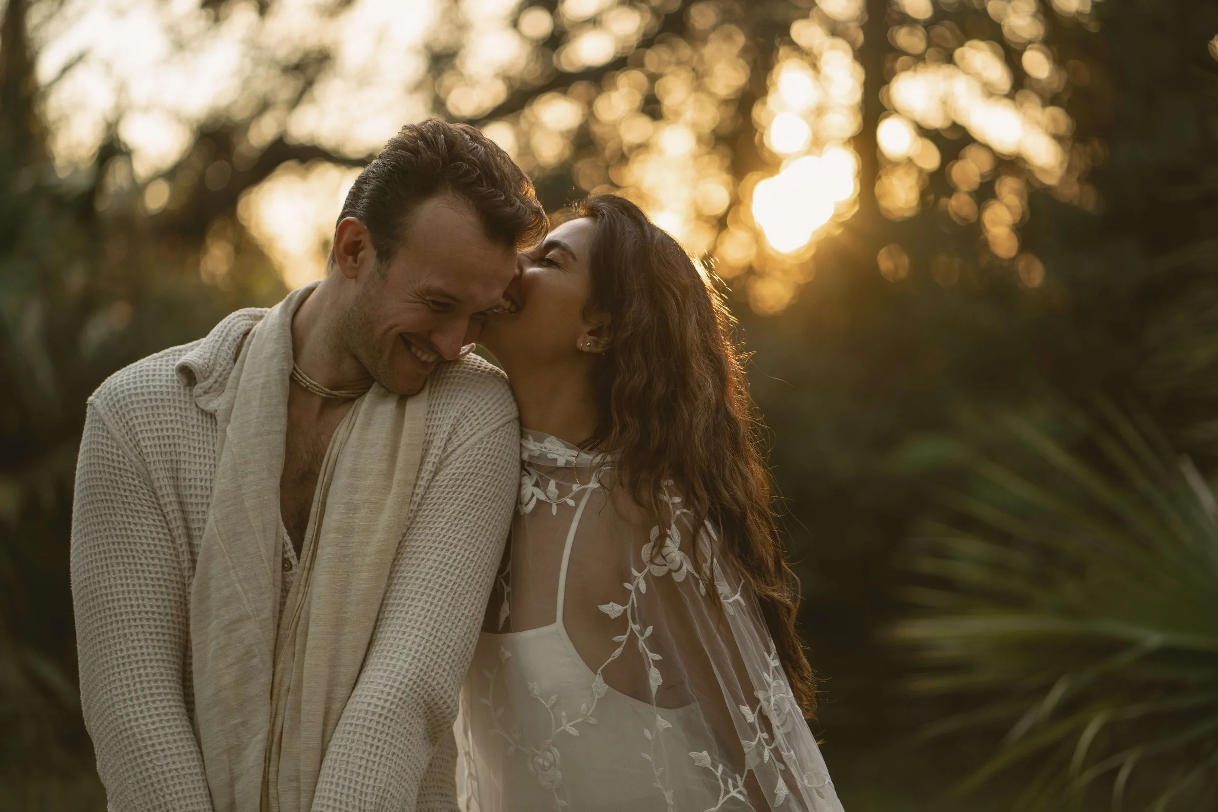 An intimate couple’s elopement at sunset. A minimalist wedding ceremony set against a quiet, expansive natural landscape.