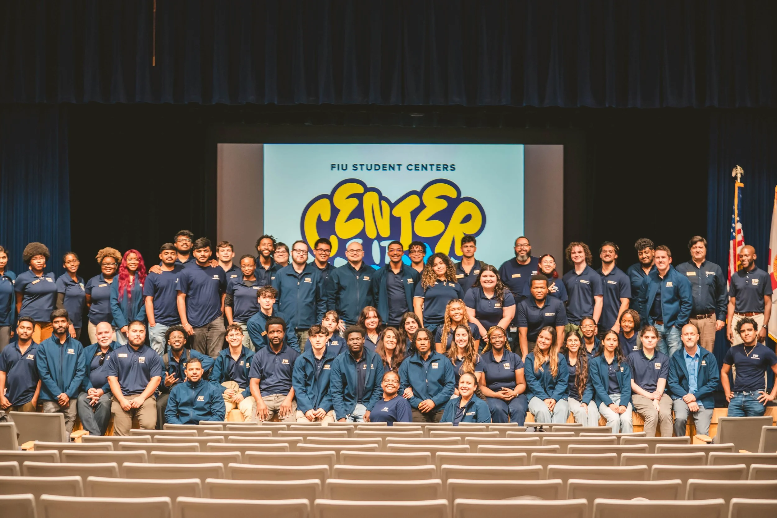 Staff Photo in Theater .jpg