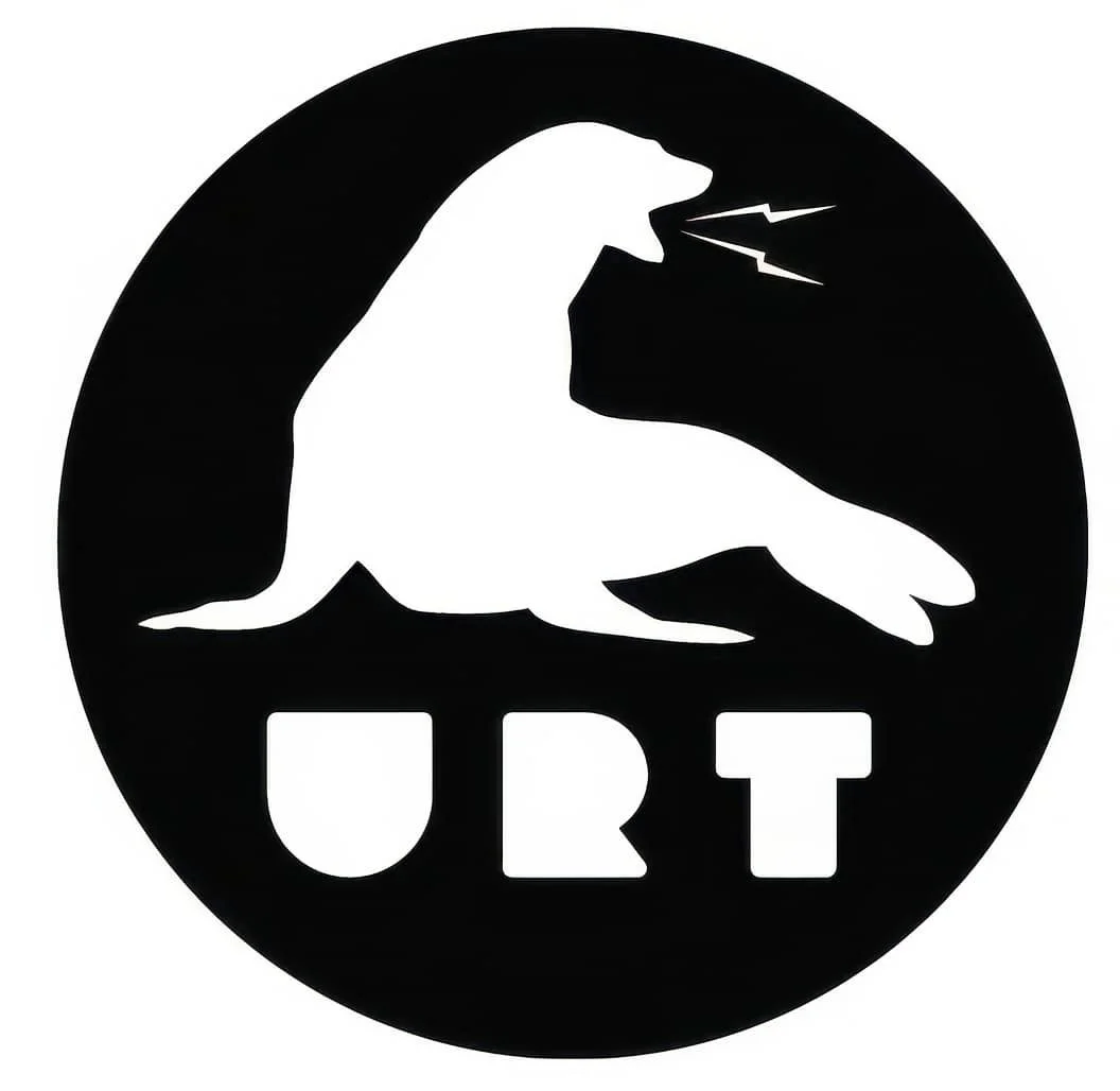 Silhouette of a whale with lightning coming from its mouth, with the word 'URT' underneath, in black and white.