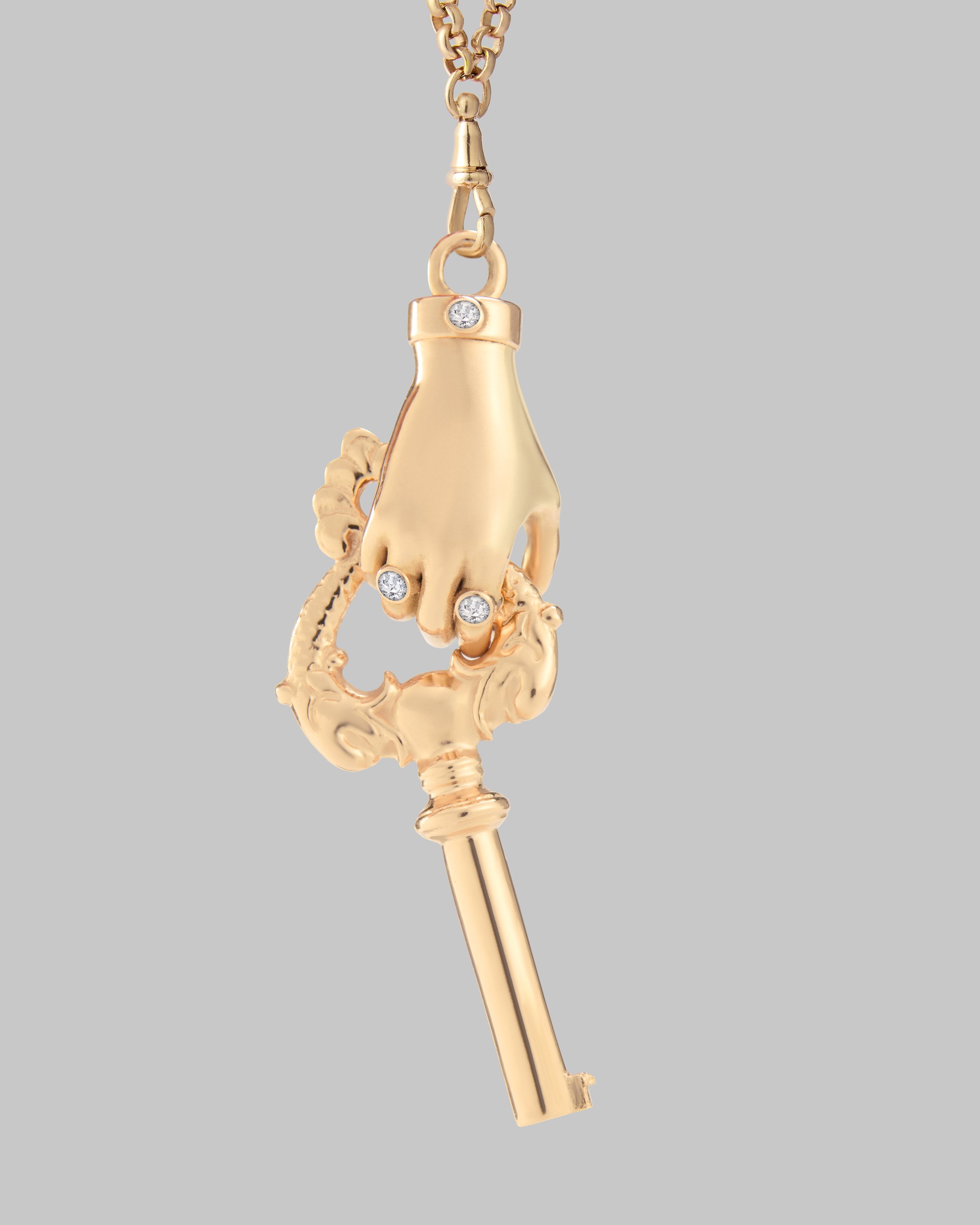 Zip Hand with Key 1_yellow gold.jpg