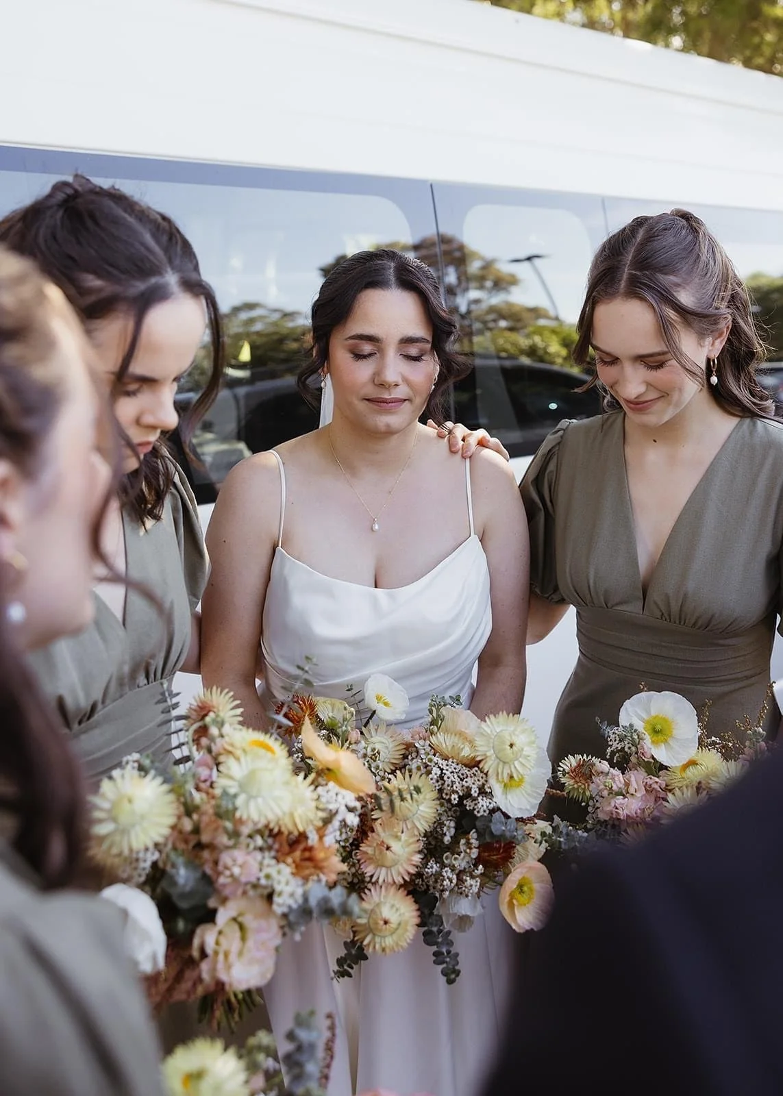 Rustic and natural winter wedding in the Illawarra with native and whimsical cottage flowers. The couple celebrated with a ceremony at Figtree Anglican Church, scenic views at Cathedral Rocks, and reception at Ruby’s Mt. Kembla, combining seasonal bl