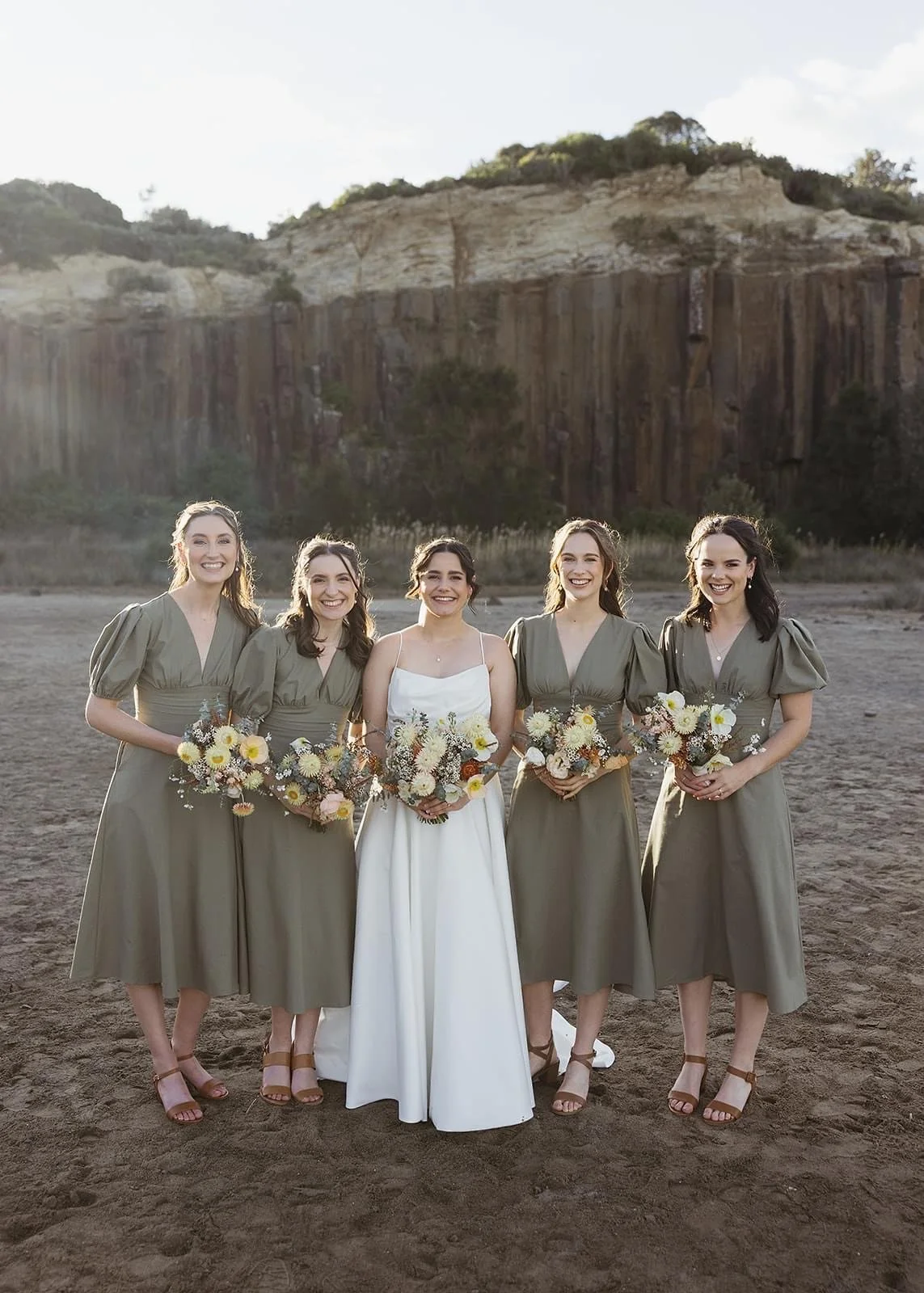 Rustic and natural winter wedding in the Illawarra with native and whimsical cottage flowers. The couple celebrated with a ceremony at Figtree Anglican Church, scenic views at Cathedral Rocks, and reception at Ruby’s Mt. Kembla, combining seasonal bl