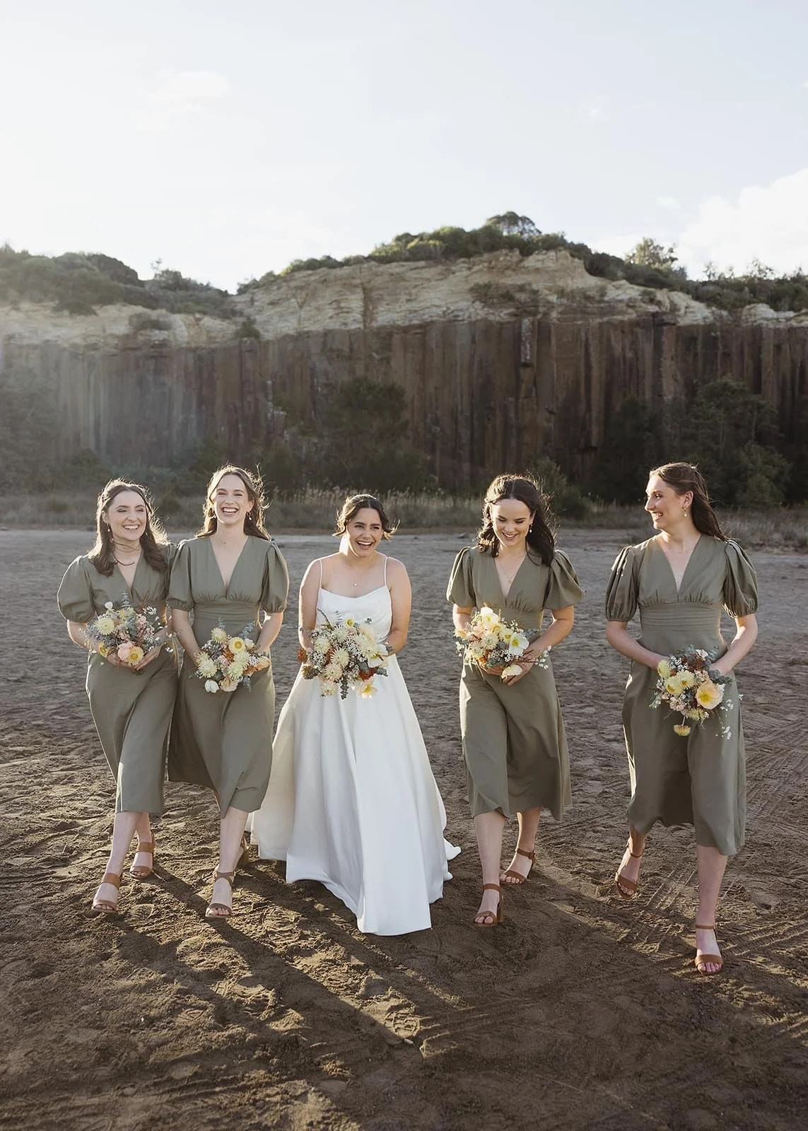 Rustic and natural winter wedding in the Illawarra with native and whimsical cottage flowers. The couple celebrated with a ceremony at Figtree Anglican Church, scenic views at Cathedral Rocks, and reception at Ruby’s Mt. Kembla, combining seasonal bl
