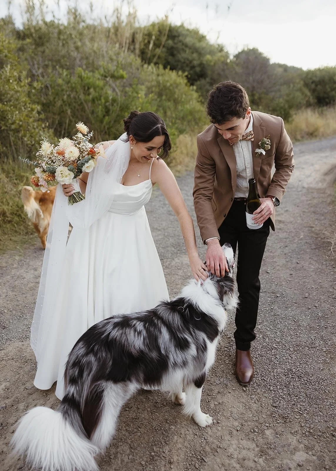 Rustic and natural winter wedding in the Illawarra with native and whimsical cottage flowers. The couple celebrated with a ceremony at Figtree Anglican Church, scenic views at Cathedral Rocks, and reception at Ruby’s Mt. Kembla, combining seasonal bl