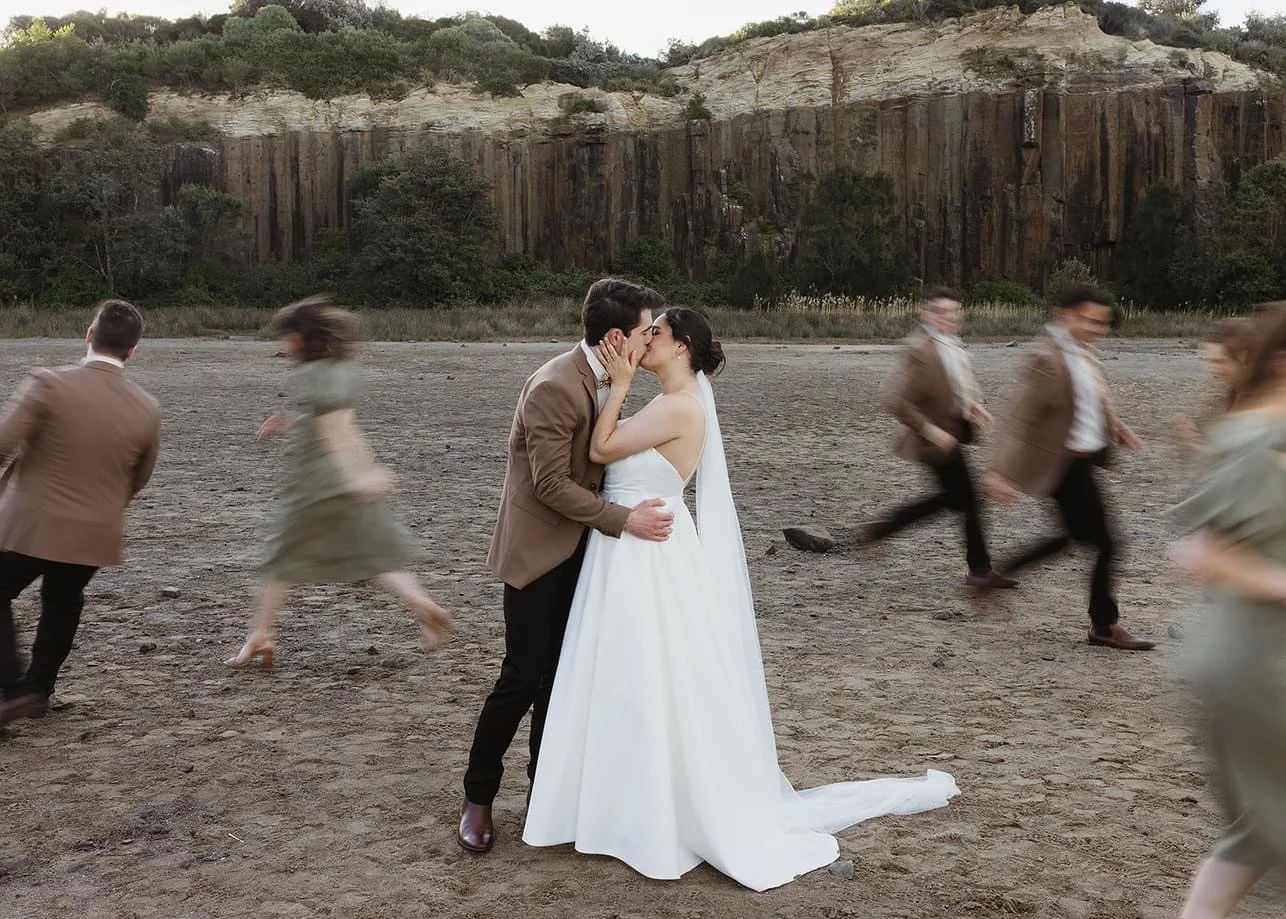 Rustic and natural winter wedding in the Illawarra with native and whimsical cottage flowers. The couple celebrated with a ceremony at Figtree Anglican Church, scenic views at Cathedral Rocks, and reception at Ruby’s Mt. Kembla, combining seasonal bl