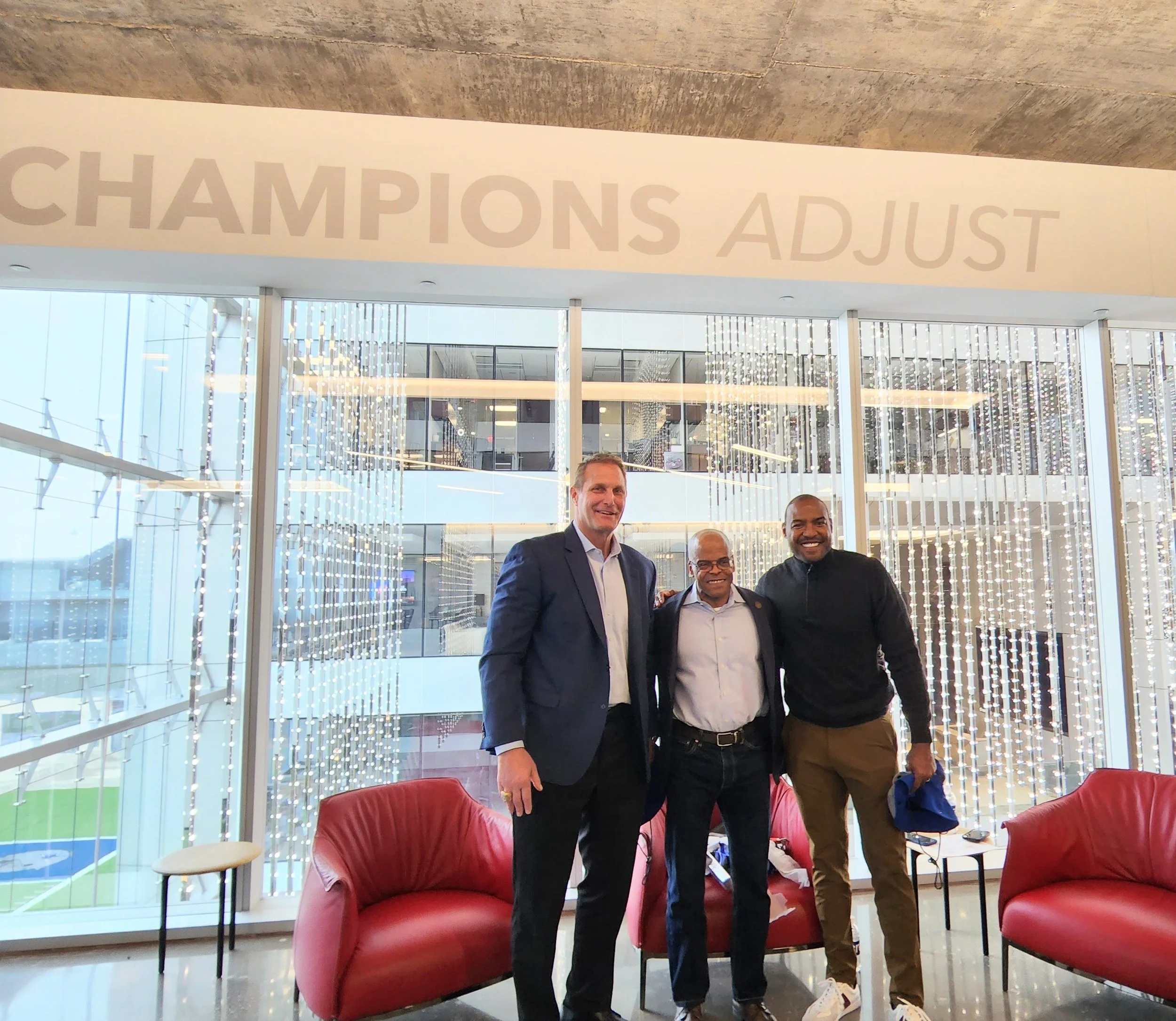 FirstWaver Darryl Smith (middle) with guest speakers Chad Hennings (left) and Darren Woodson (right)