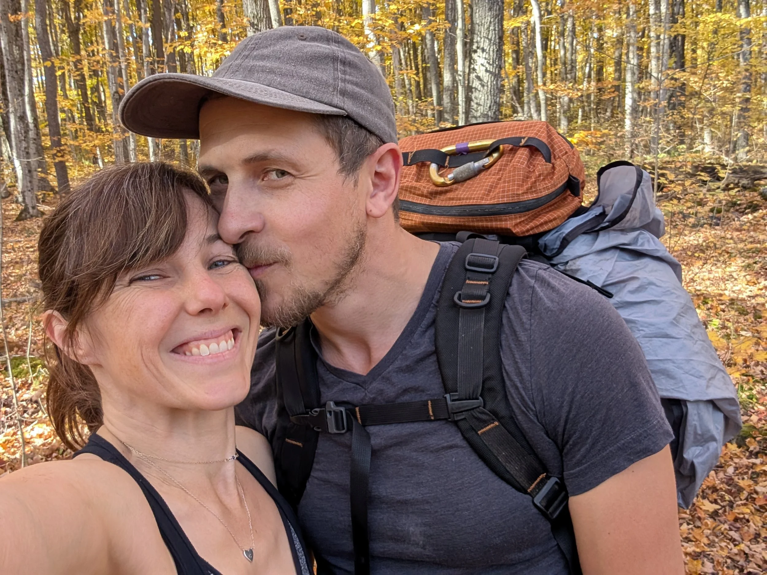 Joel and Frances Loughead on the Metcalfe trails surrounded by fall leaves.