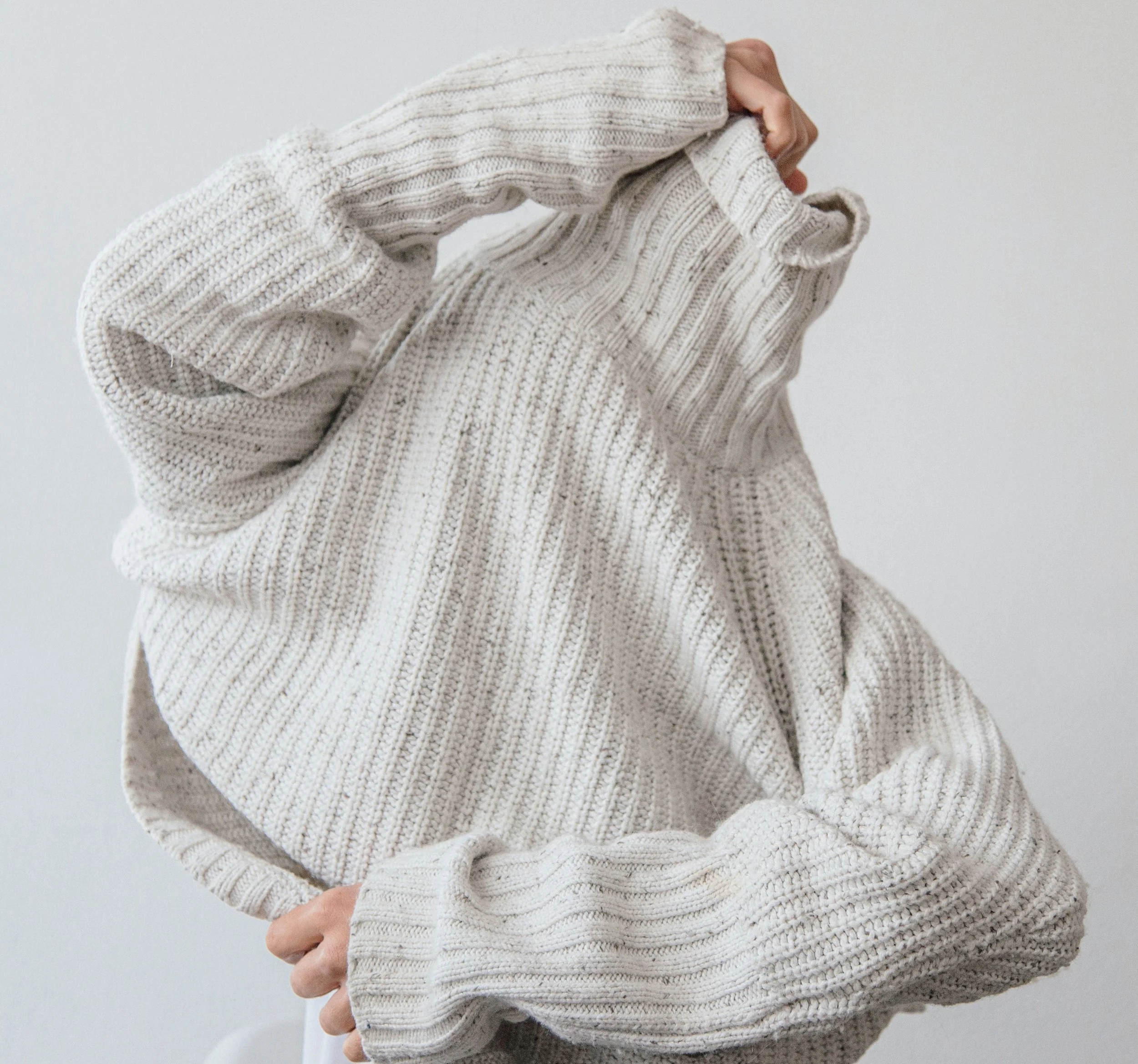 sweater off center