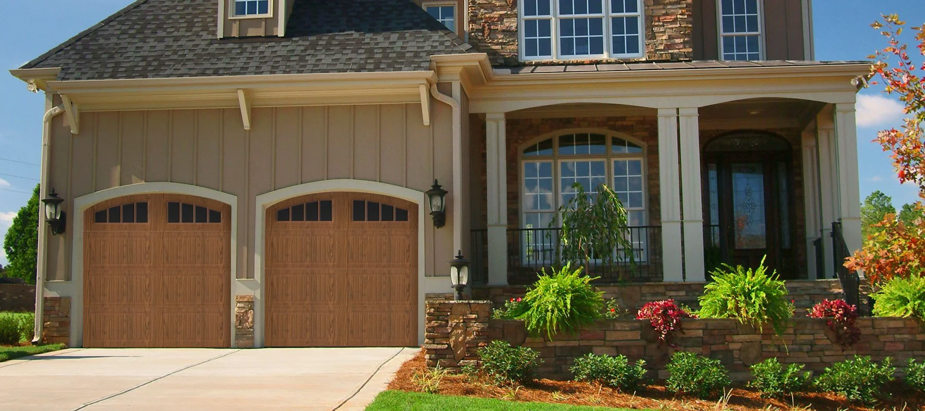 3640-long-grooved-panel-oak-garage-door.jpeg