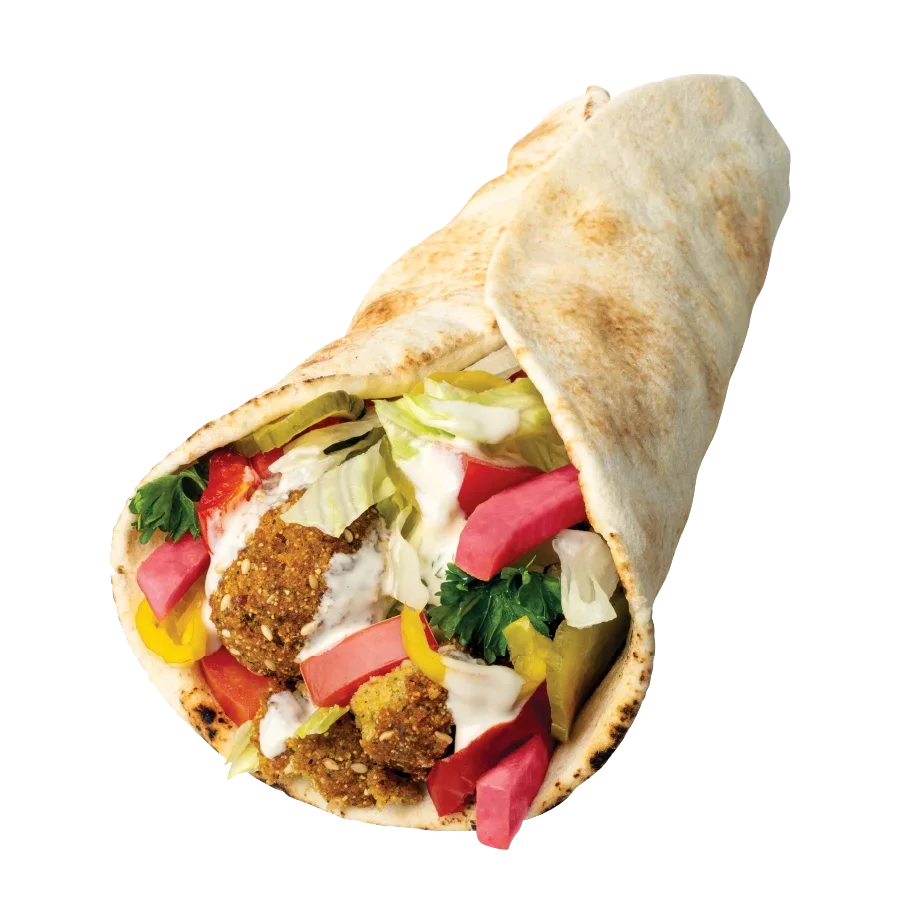 Falafel wrapped in pita with the works ingredients inside.