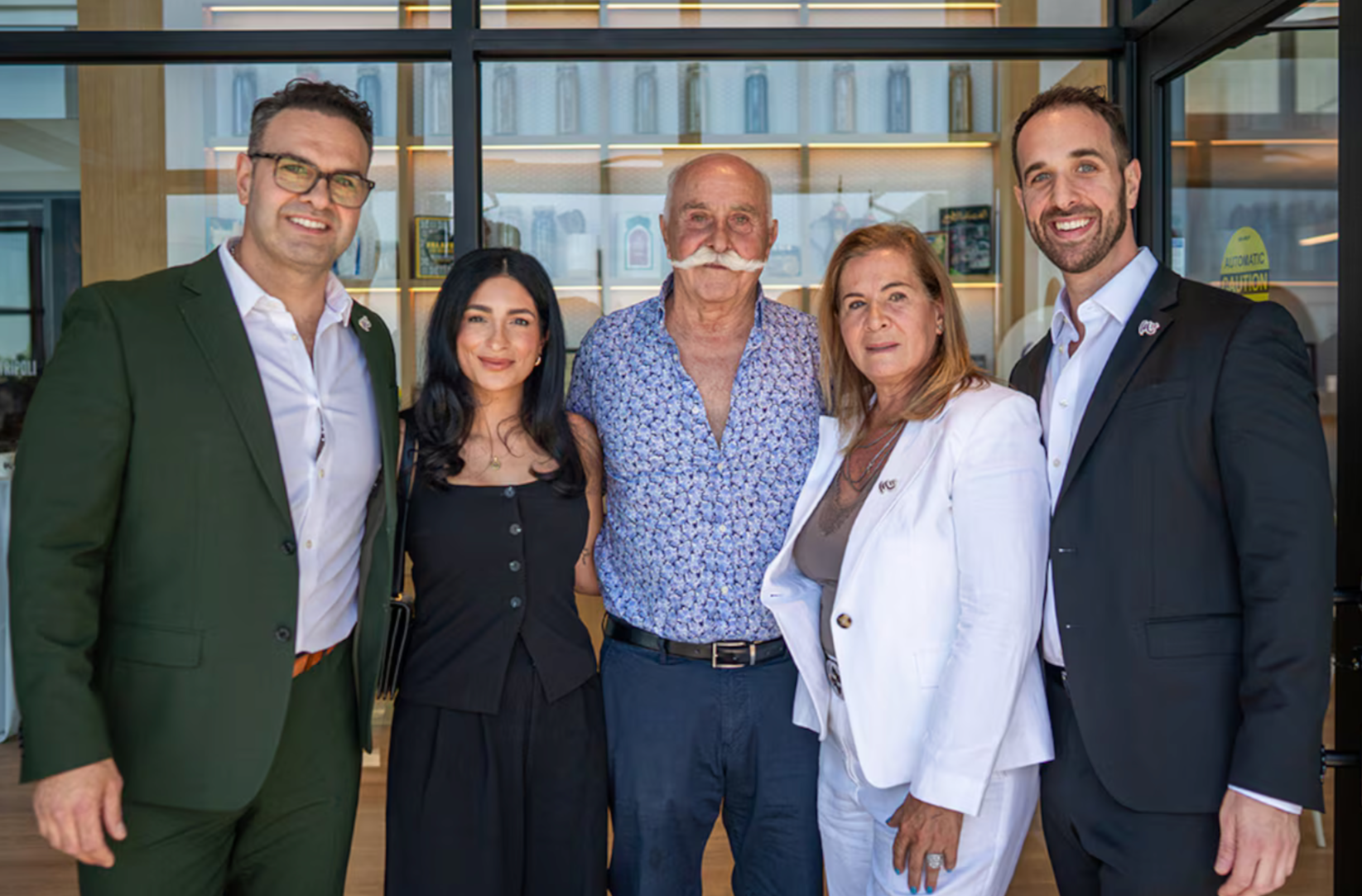 The Nahas family at Mezza’s 35th anniversary ceremony, highlighting their multigenerational family business.